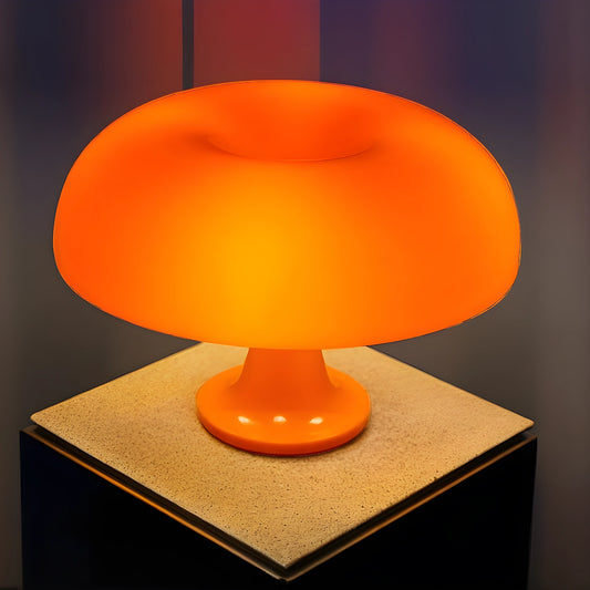 View of a contemporary sculpted acrylic mushroom table lamp in clear and frosted finishes, showcasing its unique shape and design