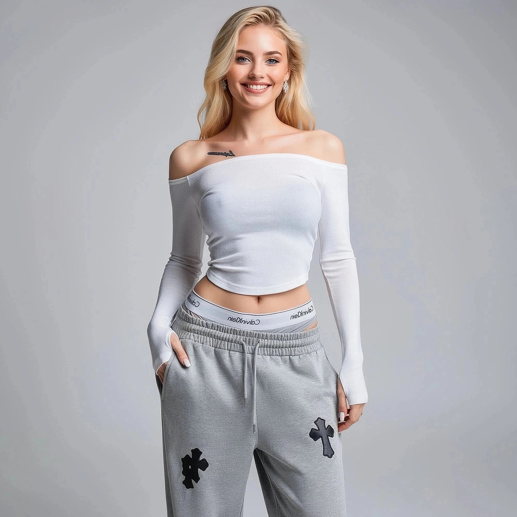 View of a fitted cropped t shirt in soft cotton, featuring a stylish slash neck and short sleeves in a light gray color