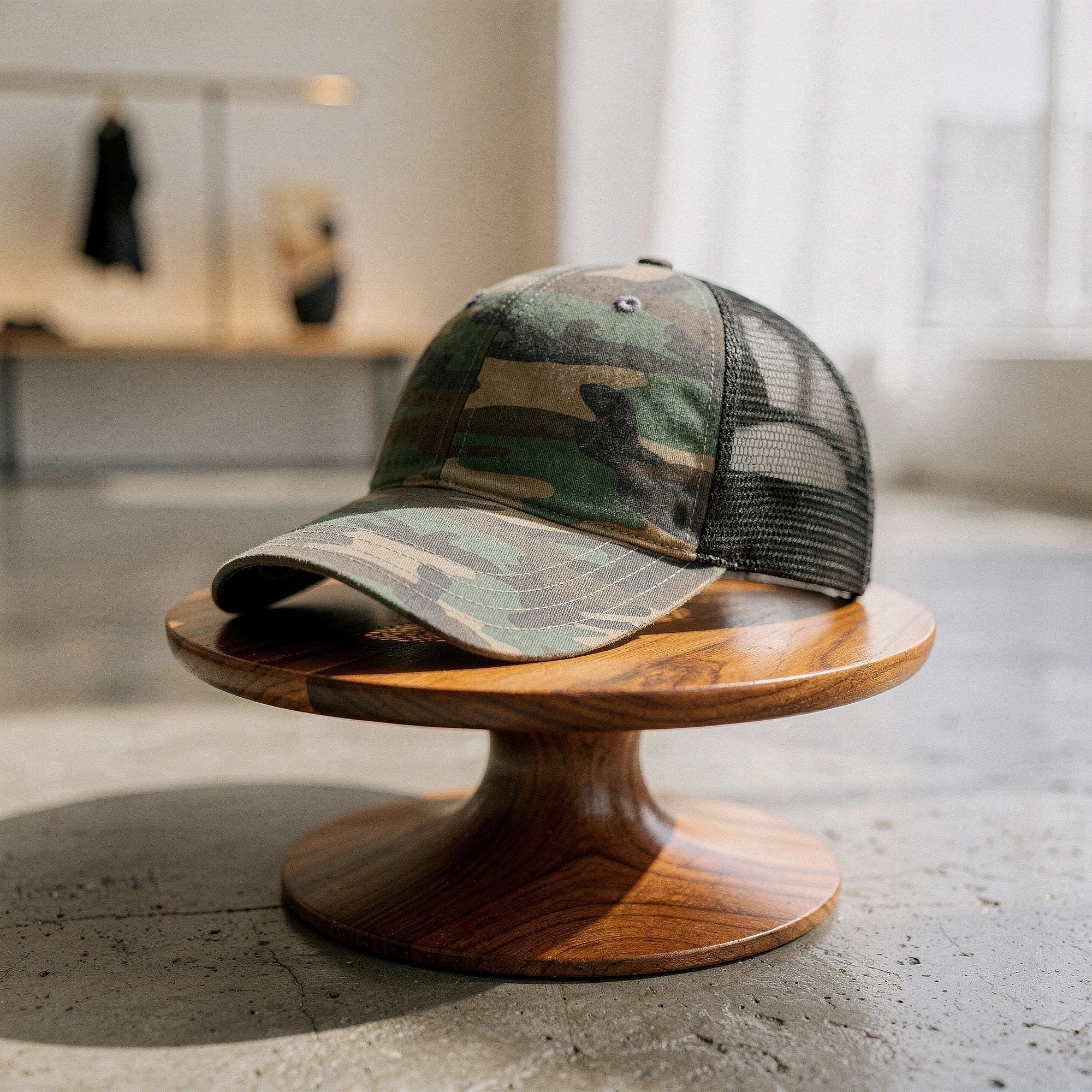 View of a relaxed vintage snapback cap in dark gray with a textured fabric and adjustable strap