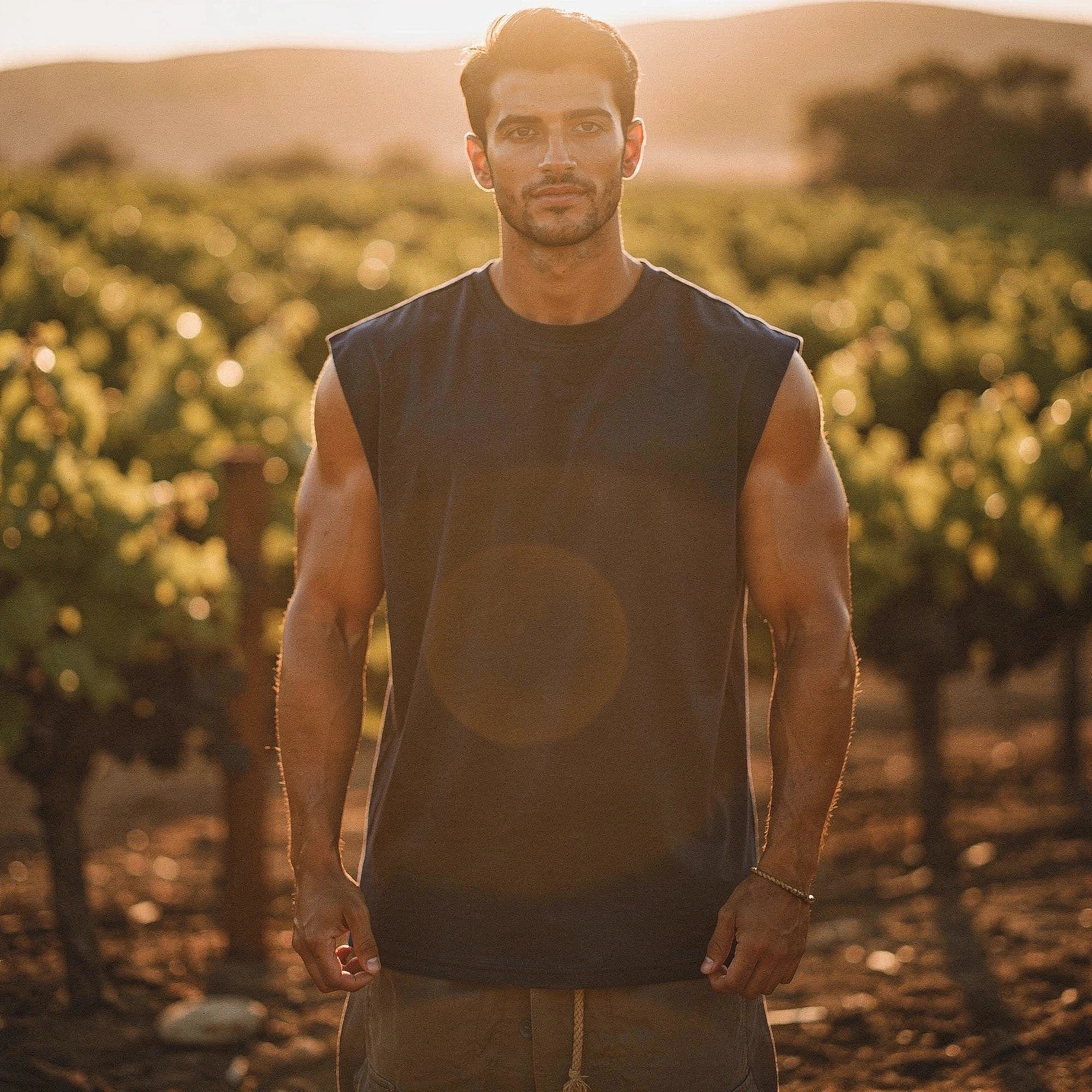 View of a sleek, comfortable summer tank top in light grey, featuring soft fabric and a relaxed fit