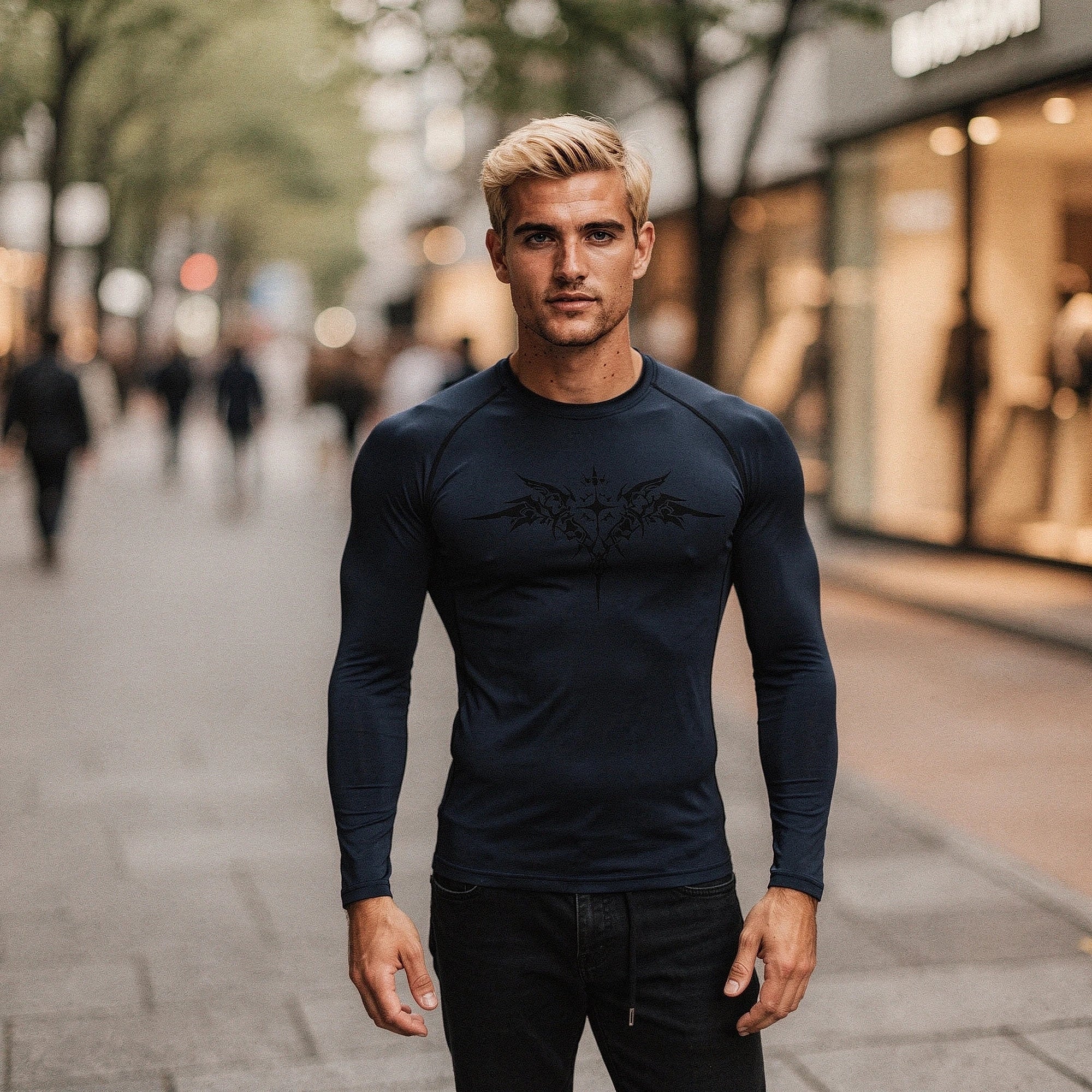 View of a black quick drying compression tee featuring a fitted design and moisture wicking fabric