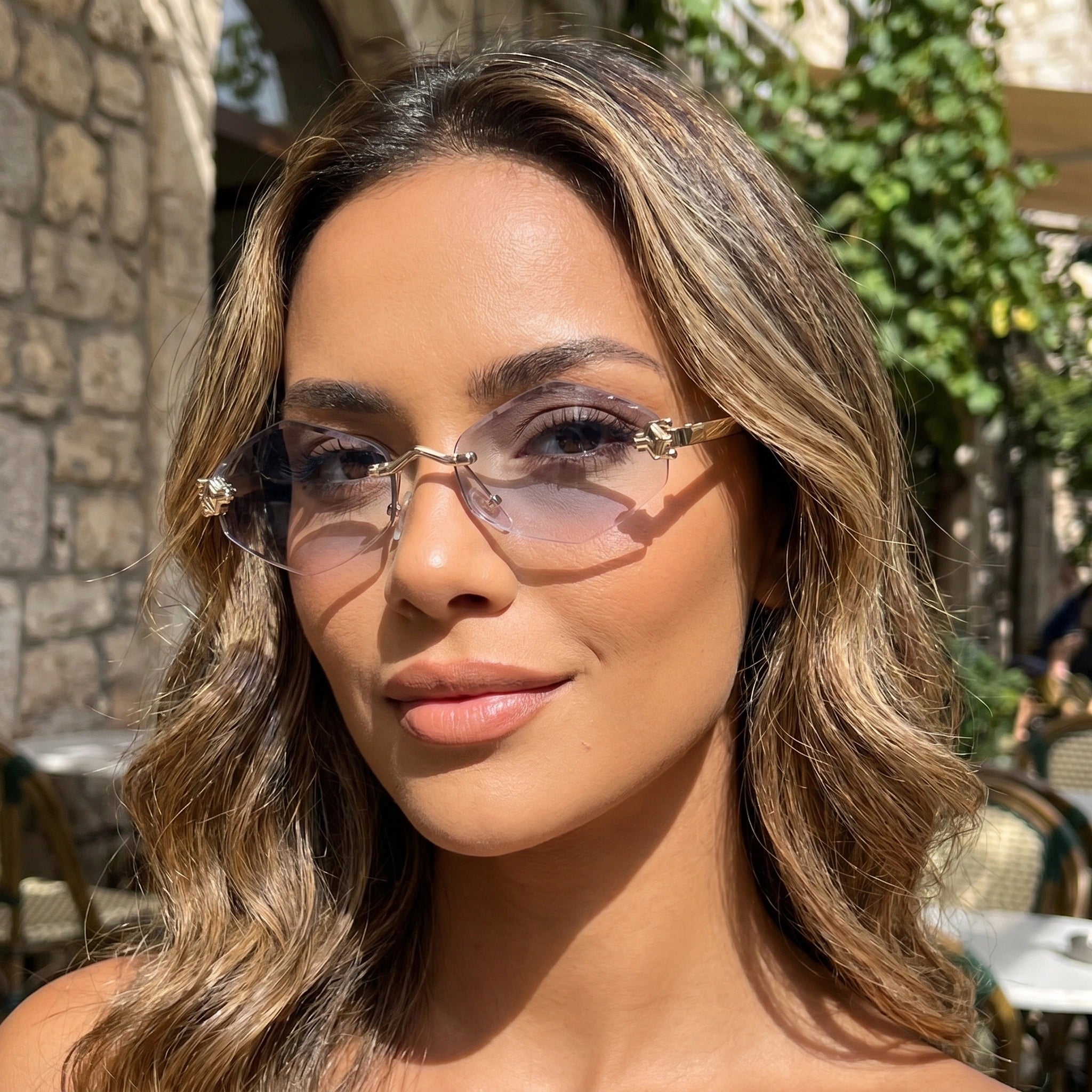 Close up view showing the intricate stitching and vintage polygonal frame of the Womens Vintage Polygonal Sunglasses against a soft neutral background.