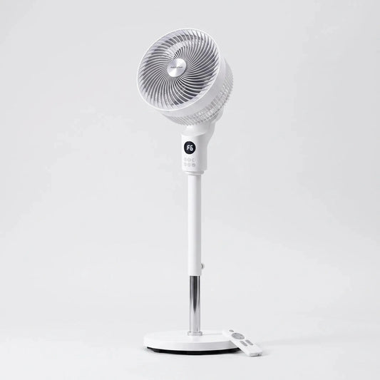 The view showcases the sleek design and adjustable height feature, highlighting the oscillation mechanism and power cord placement