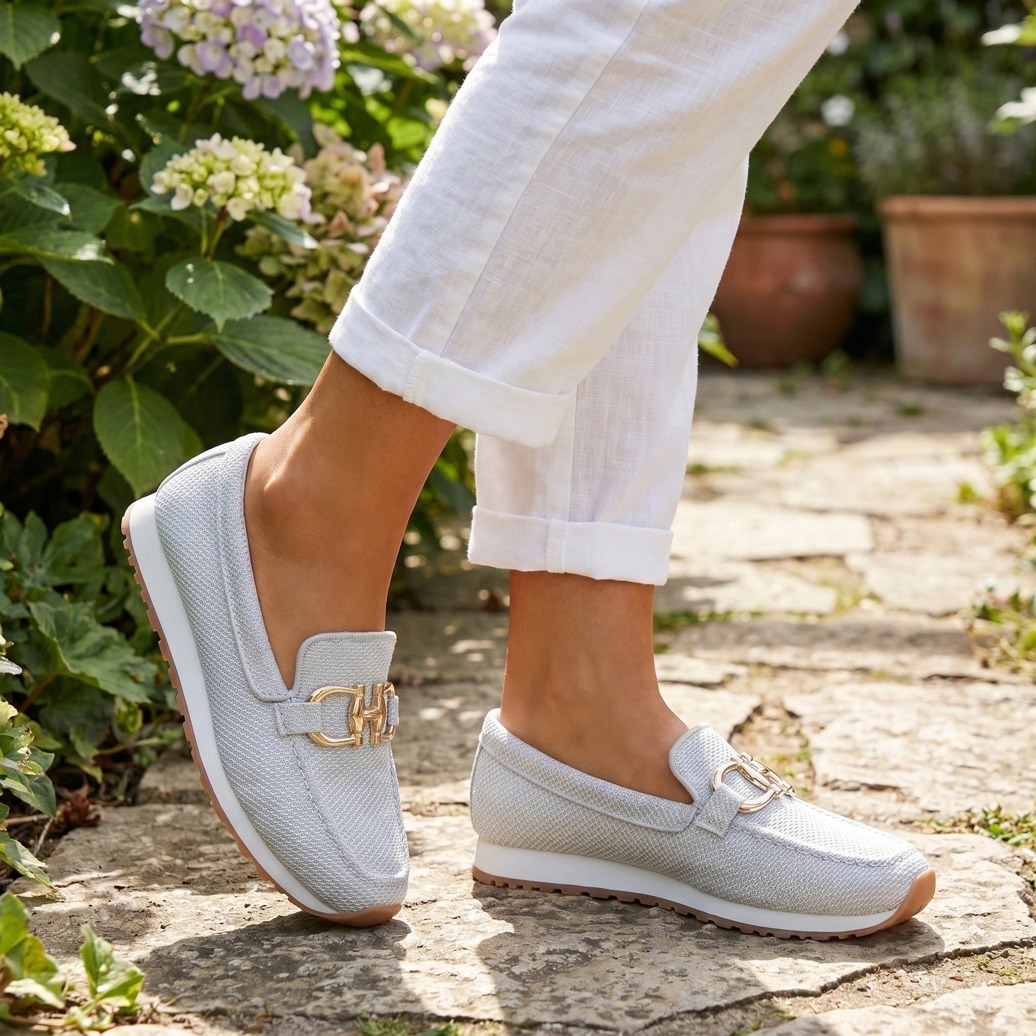 Close up view showing the breathable fabric and intricate stitching details of the Women's Summer Orthopedic Loafers in a soft beige color.