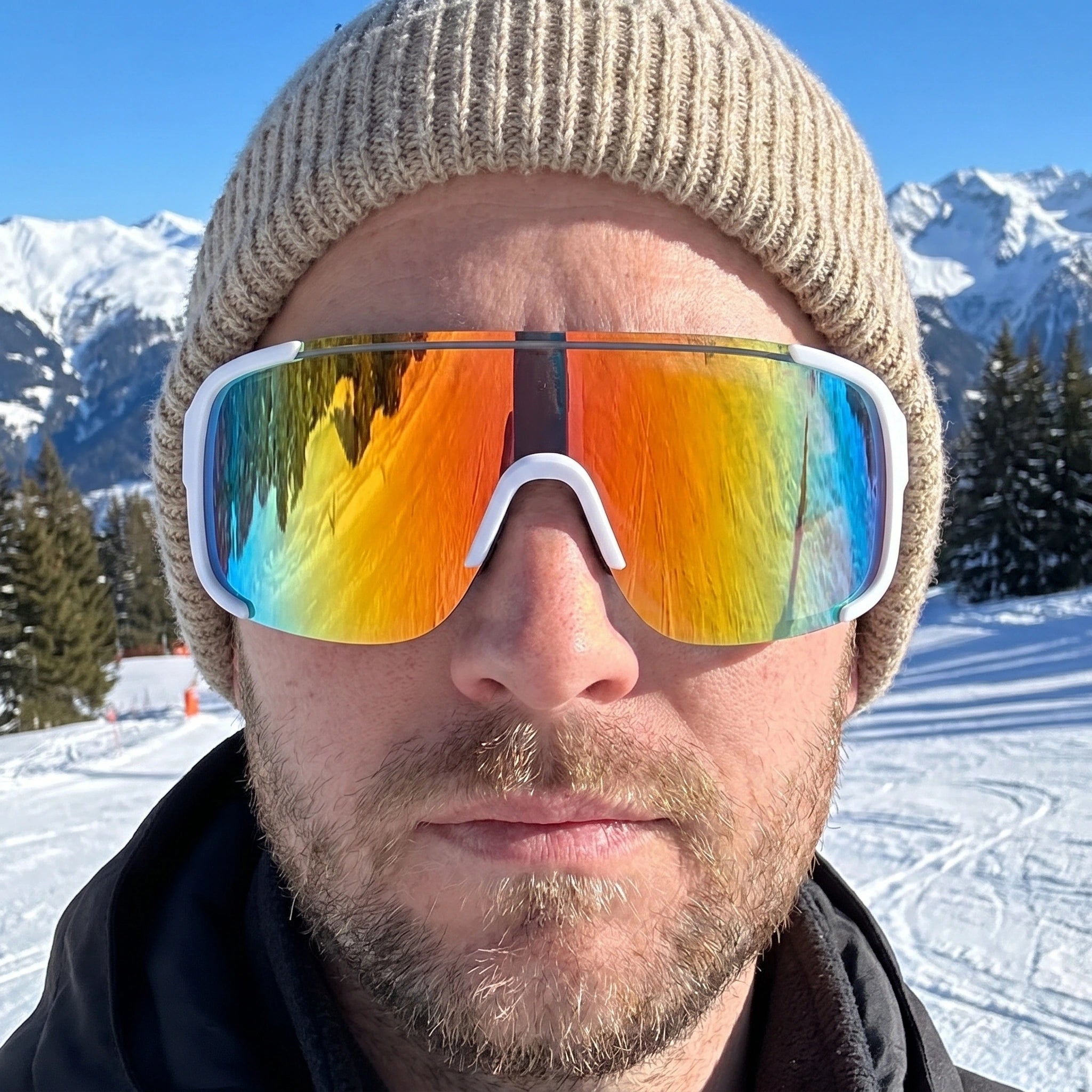 A model showcases Mens Retro Reflective Sport Sunglasses in a vibrant outdoor setting, paired with a sporty outfit showing a lightweight jacket and athletic shorts.