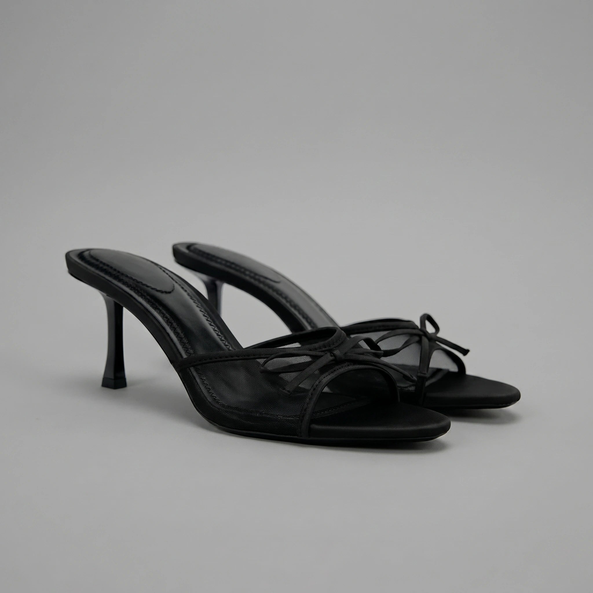 Close up view showing the intricate stitching and soft fabric of the Womens Peep Toe Summer Heels in a neutral tone.