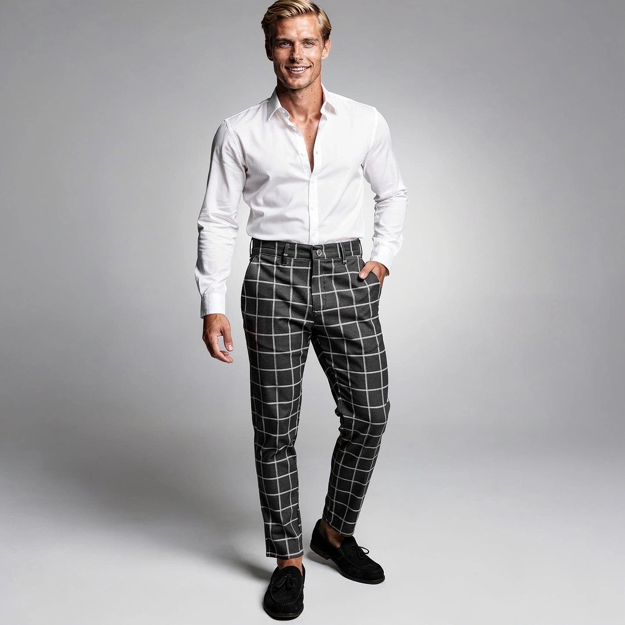 View of modern tailored tapered trousers in charcoal gray fabric, featuring a sleek design and tailored fit