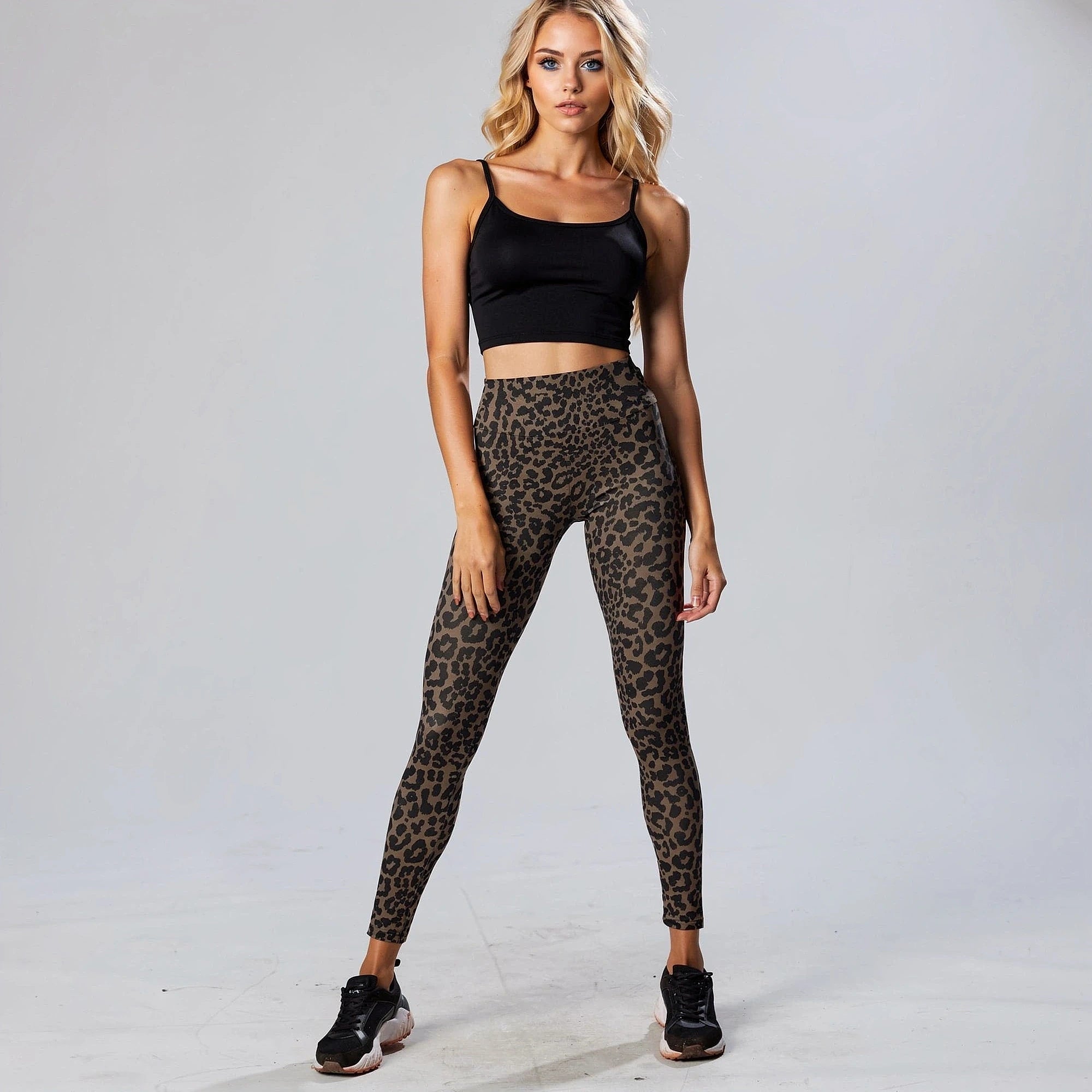 View of high waisted fitted leggings featuring a stylish leopard print pattern, ideal for yoga and fitness workouts