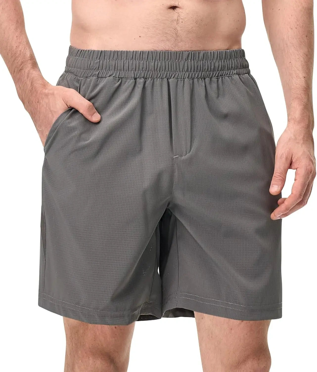 View of men's athletic shorts in dark gray, made from quick dry breathable fabric with an elastic waistband
