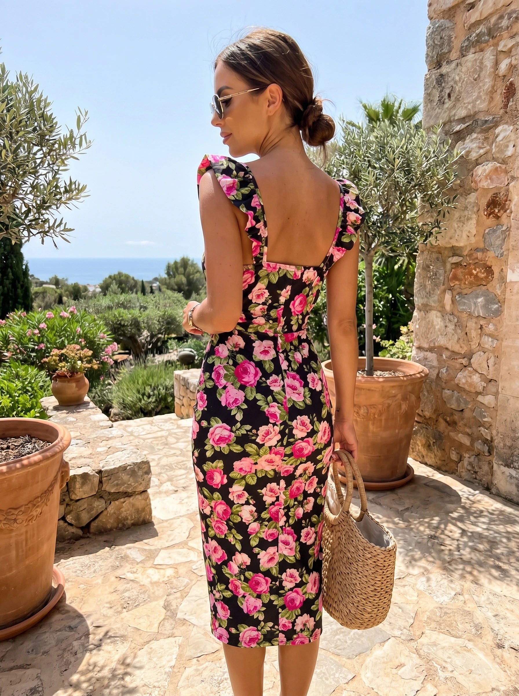 Close up view of the Womens Charming Floral Midi Dress showing intricate floral patterns and delicate stitching, emphasizing its summer style and high quality fabric.