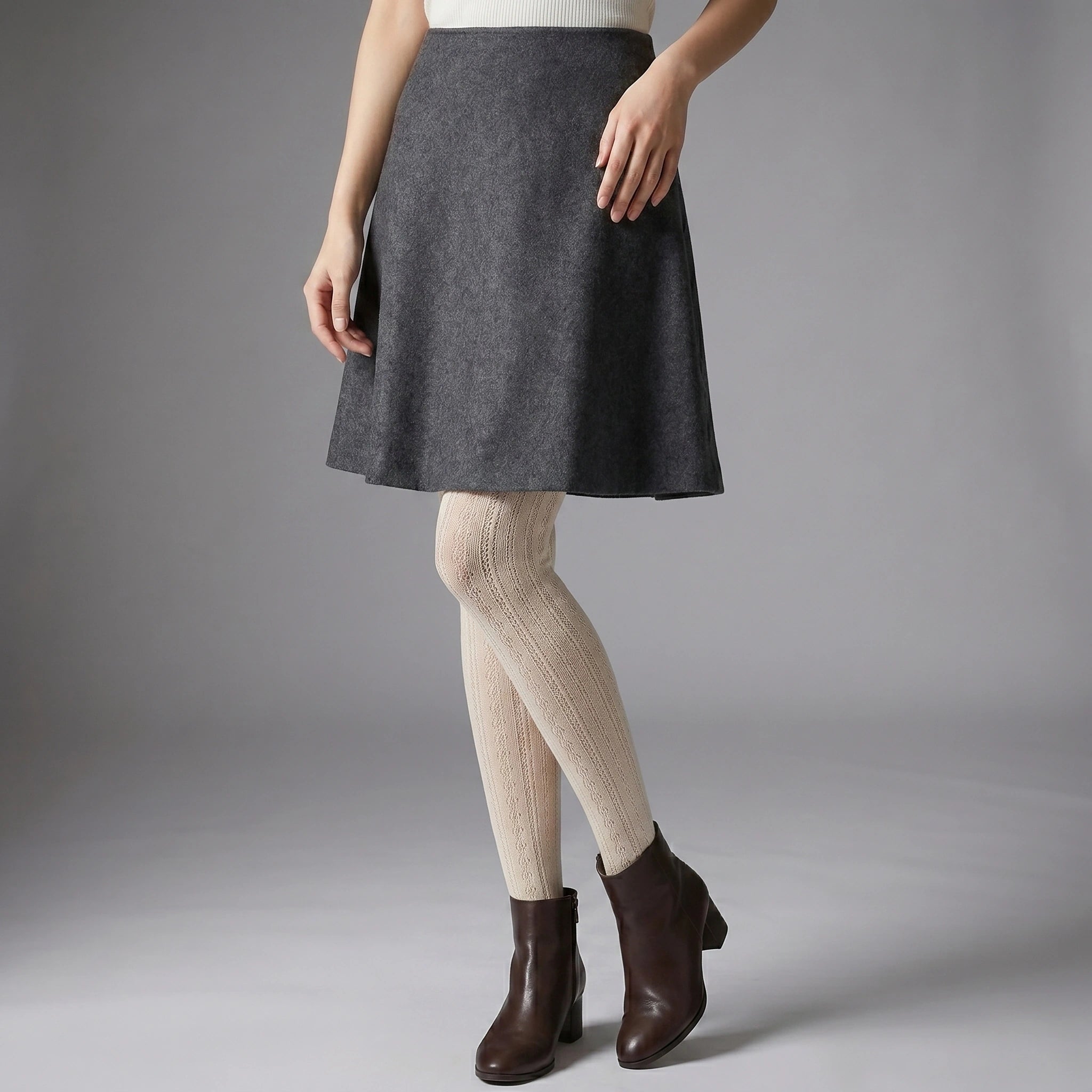 Close up view of the women's striped tights showing the intricate fabric texture, high quality stitching, and autumn color palette.