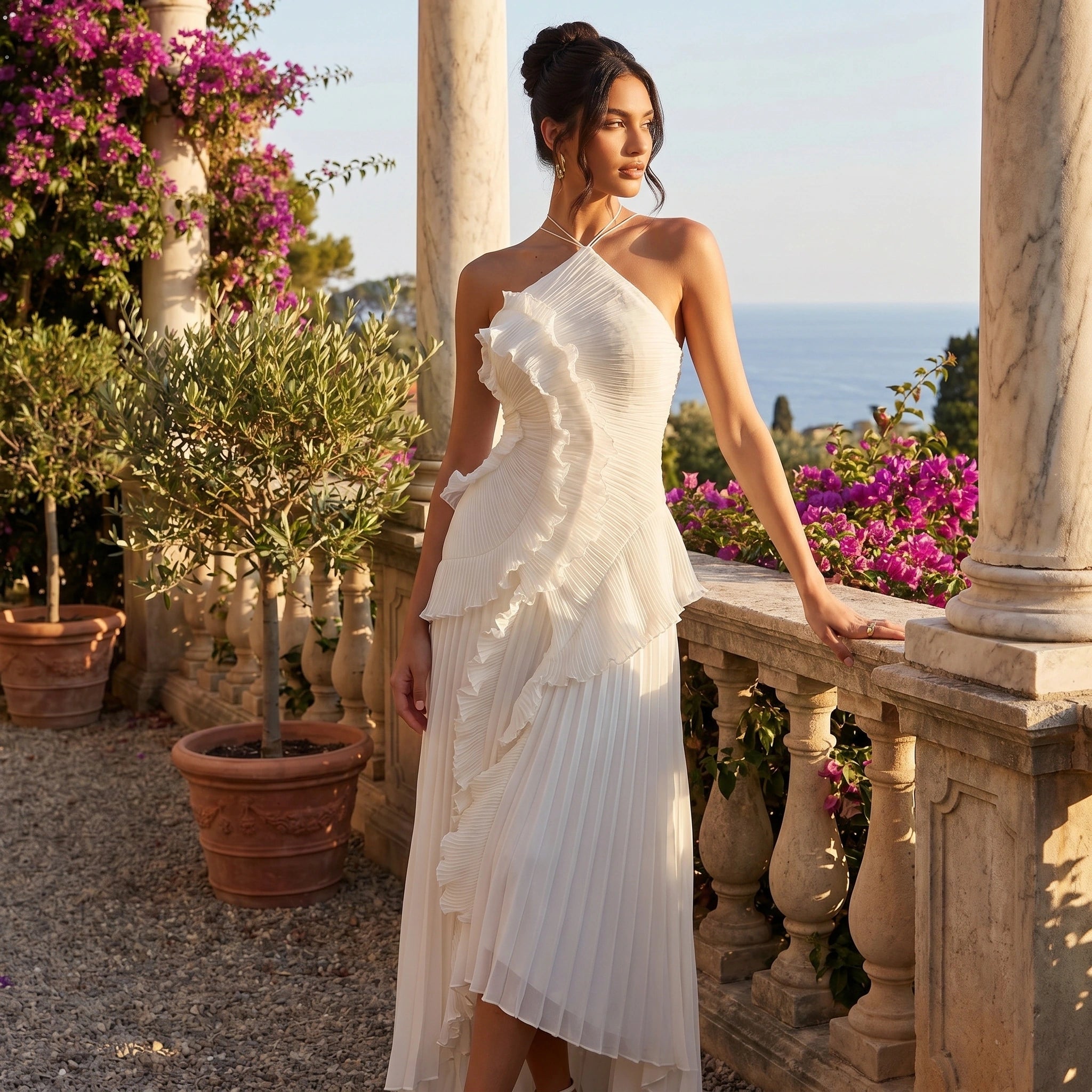 Close up of the Womens Pleated Maxi Dress showing the soft fabric, intricate stitching, and pleats in a colorful against a neutral background.