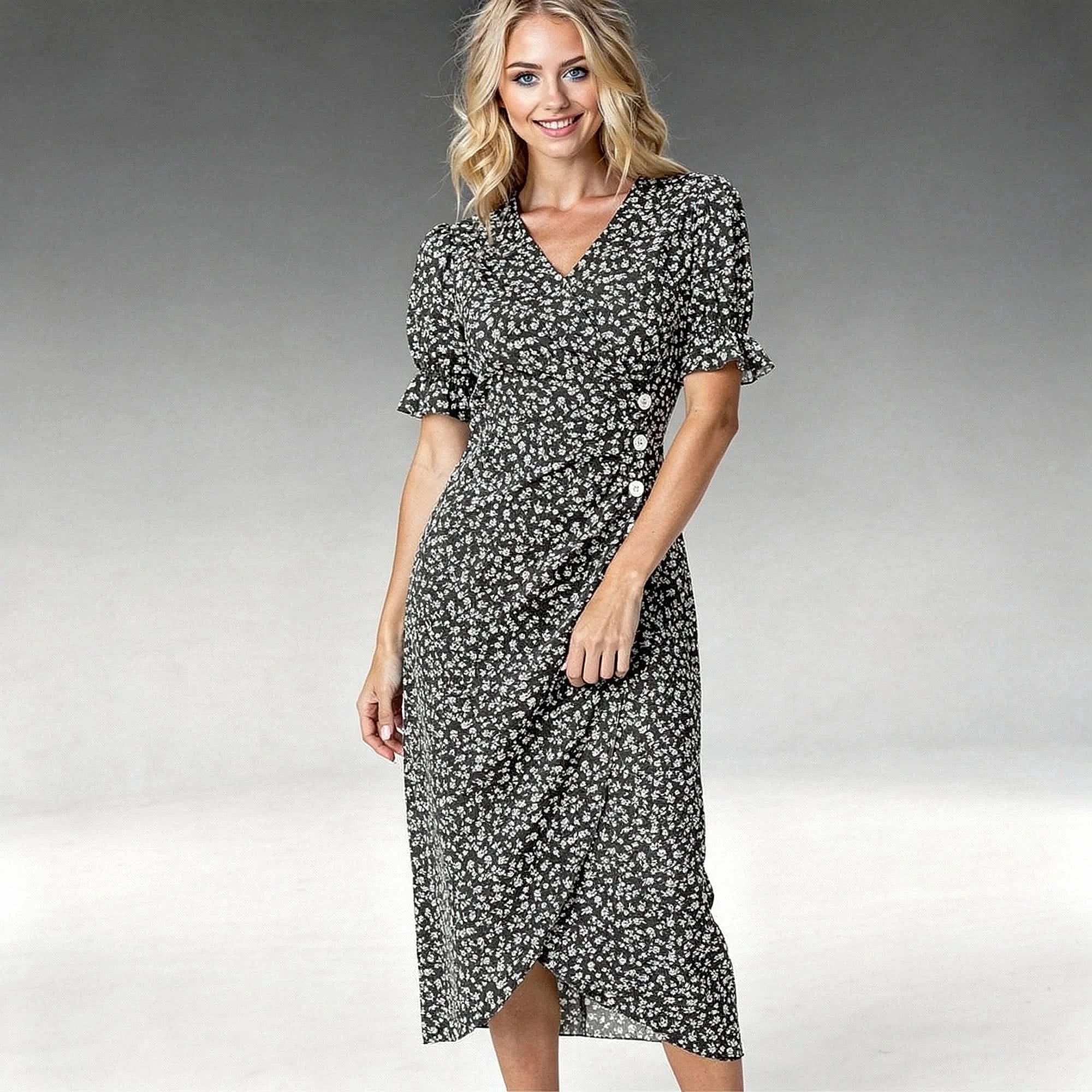 Elegant floral midi dress featuring puff sleeves, a fitted bodice, and a flowing skirt in soft pastel colors, view