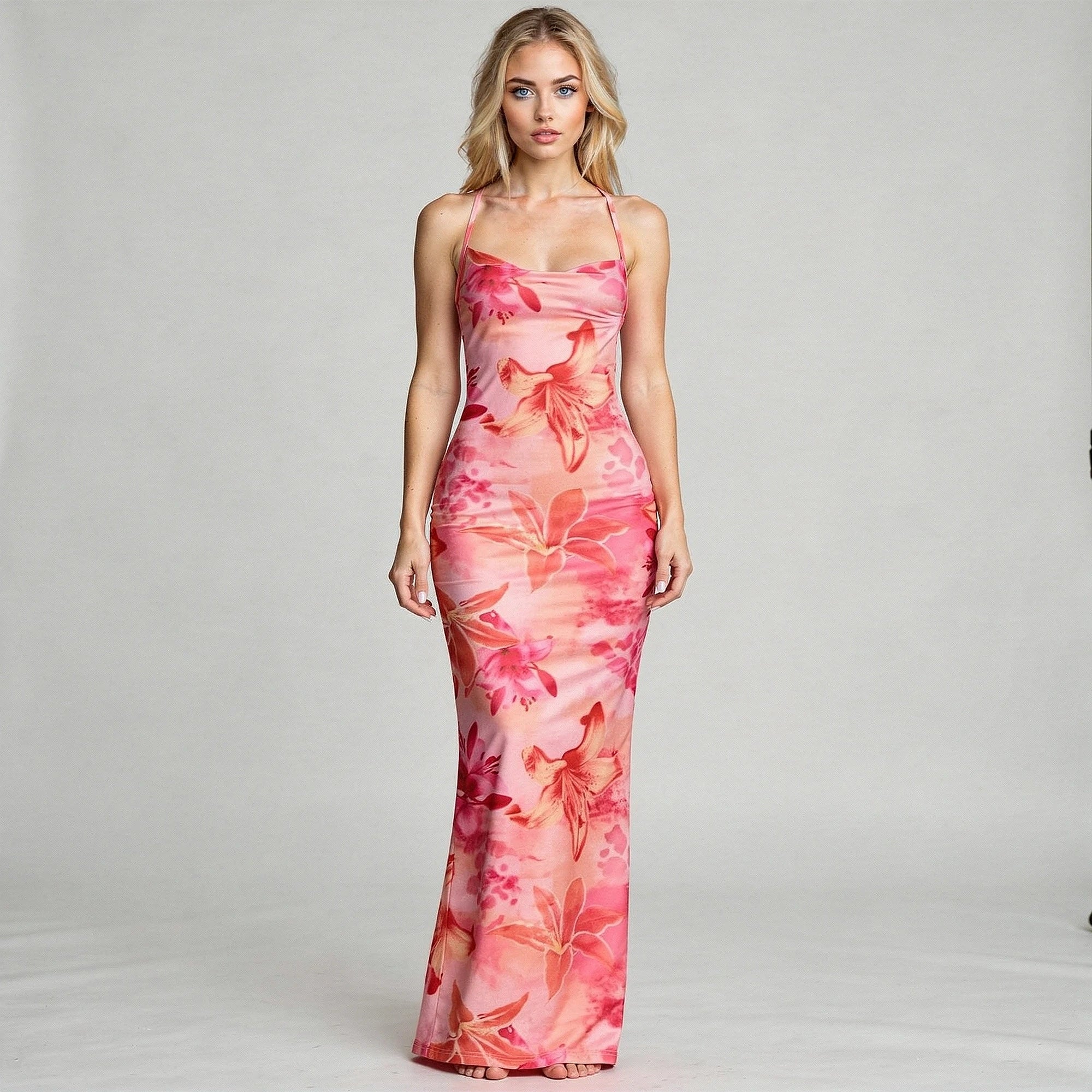 View of an off shoulder mermaid dress in deep red, featuring a fitted bodice and flowing skirt
