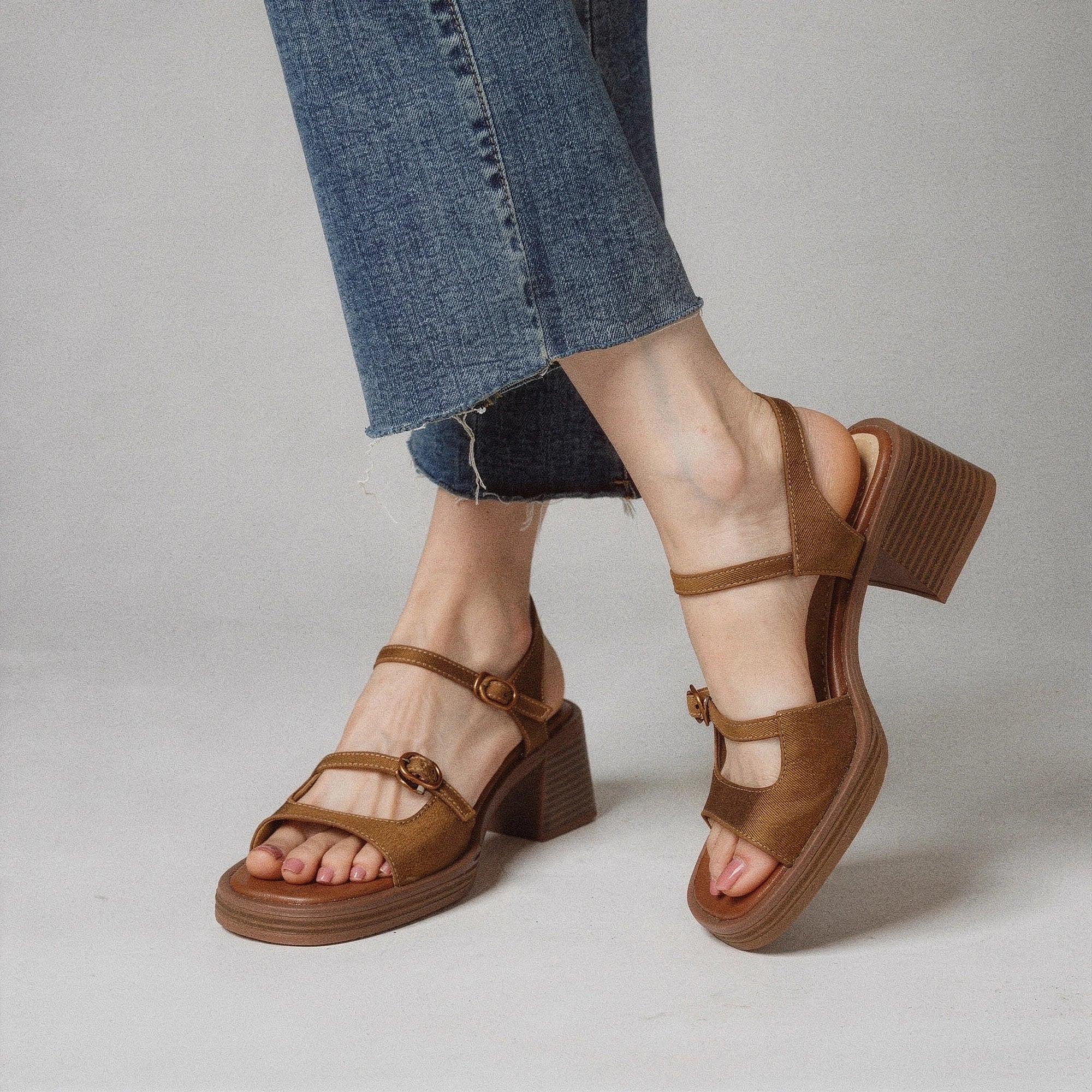 View of chic adjustable buckle platform sandals in tan, featuring a stylish design and casual look