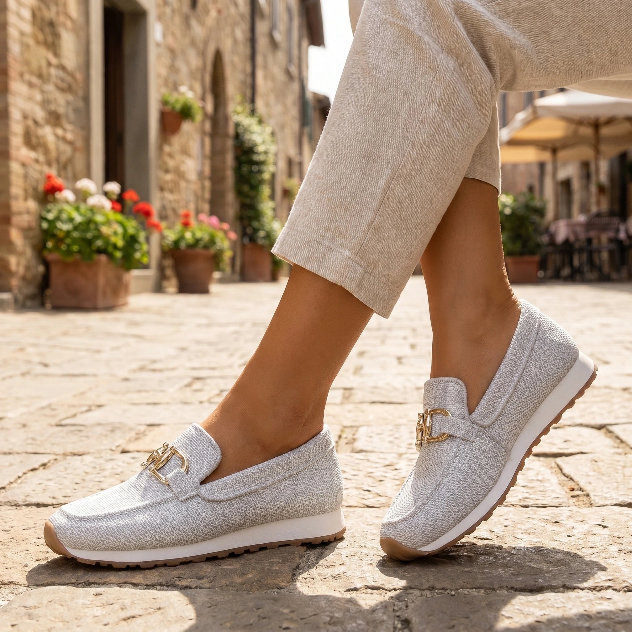 Back view of a model showing the Womens Breathable Summer Orthopedic Loafers in a soft beige color, showing the design and construction details against a neutral background.