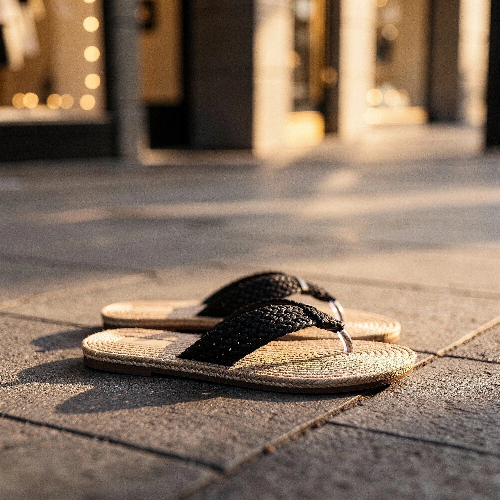 View of relaxed textured imitation hemp flip flops in natural beige color, showcasing the soft footbed and patterned straps