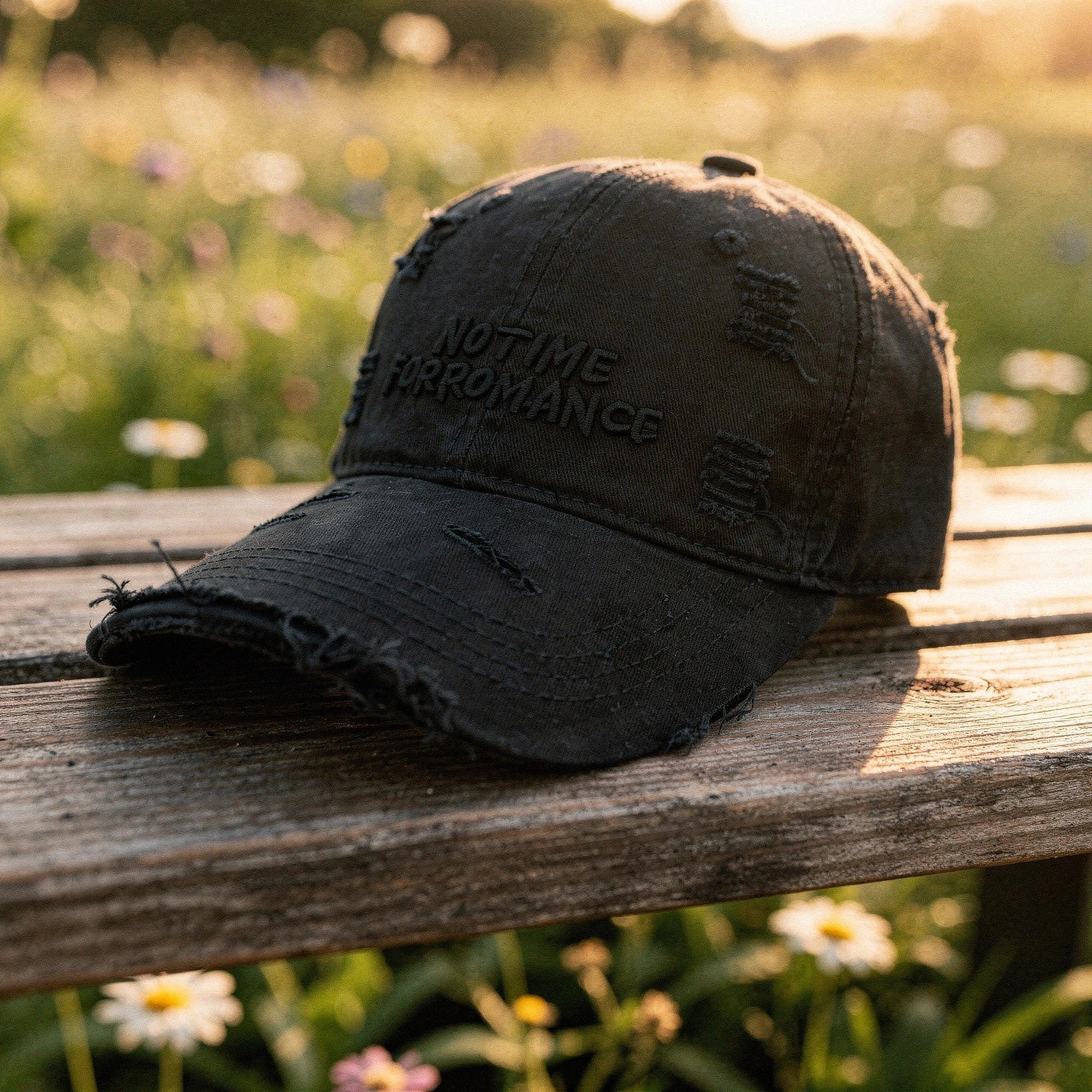 Light blue distressed baseball cap made of cotton, featuring a curved brim and adjustable strap, detailed view