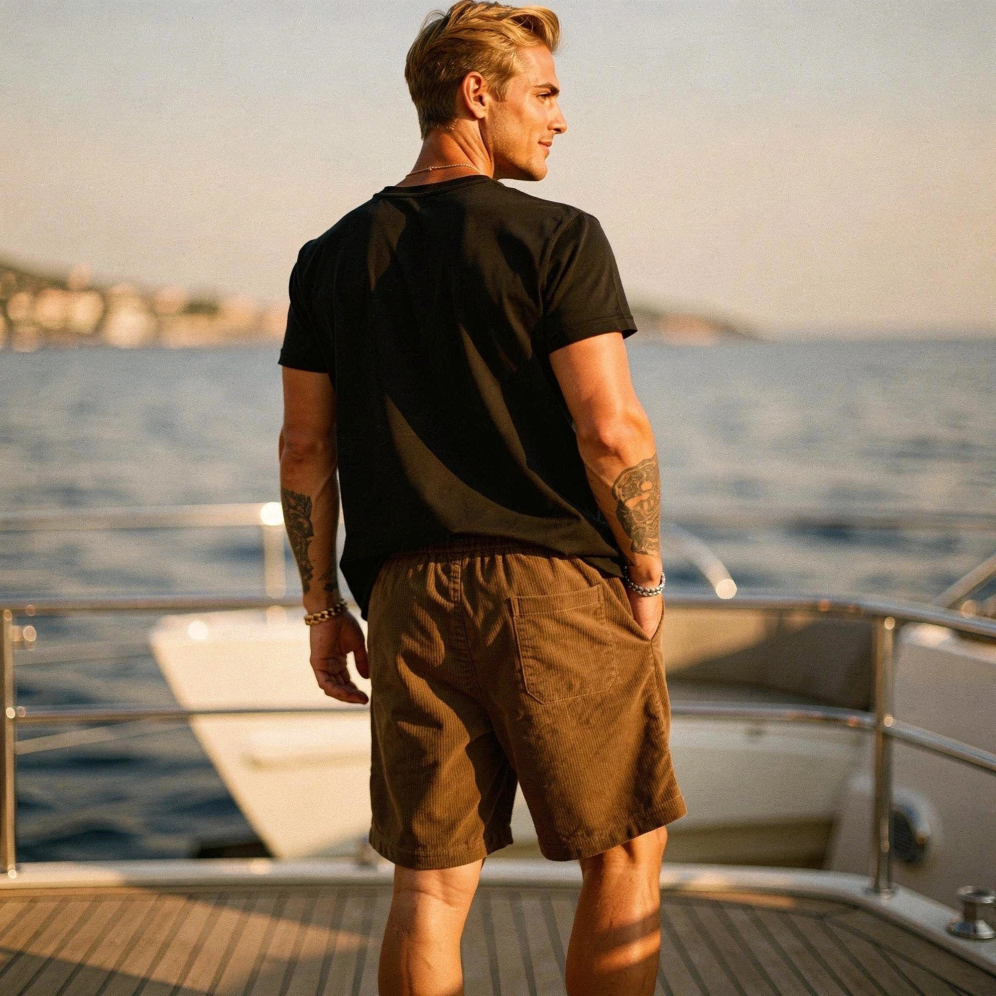 Light gray men's relaxed summer shorts made of stretchy fabric, featuring pockets and a comfortable waistband, view