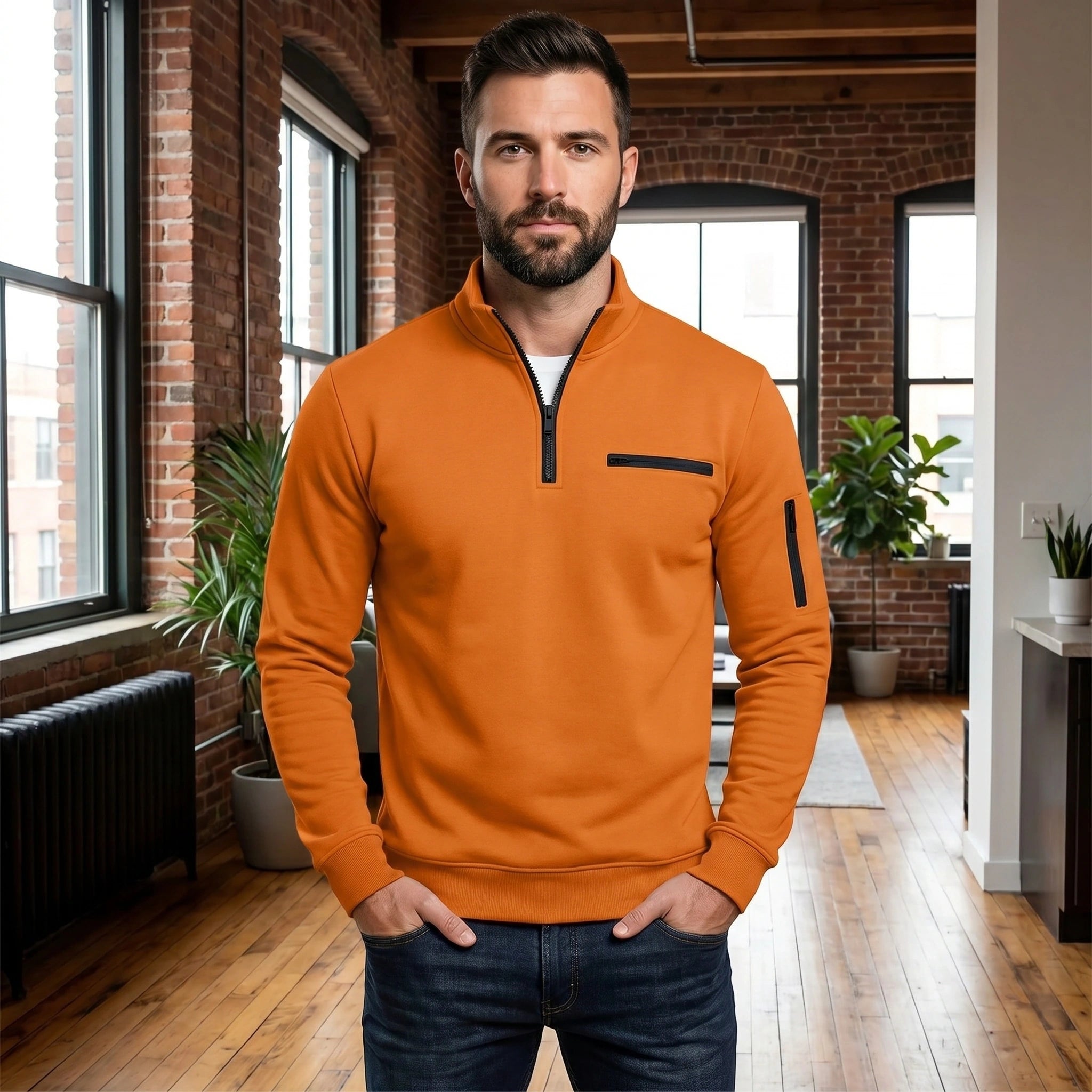 Close up of the Men's Quarter Zip Sweater showing the soft fabric texture, precise stitching, and modern design elements against a neutral background.