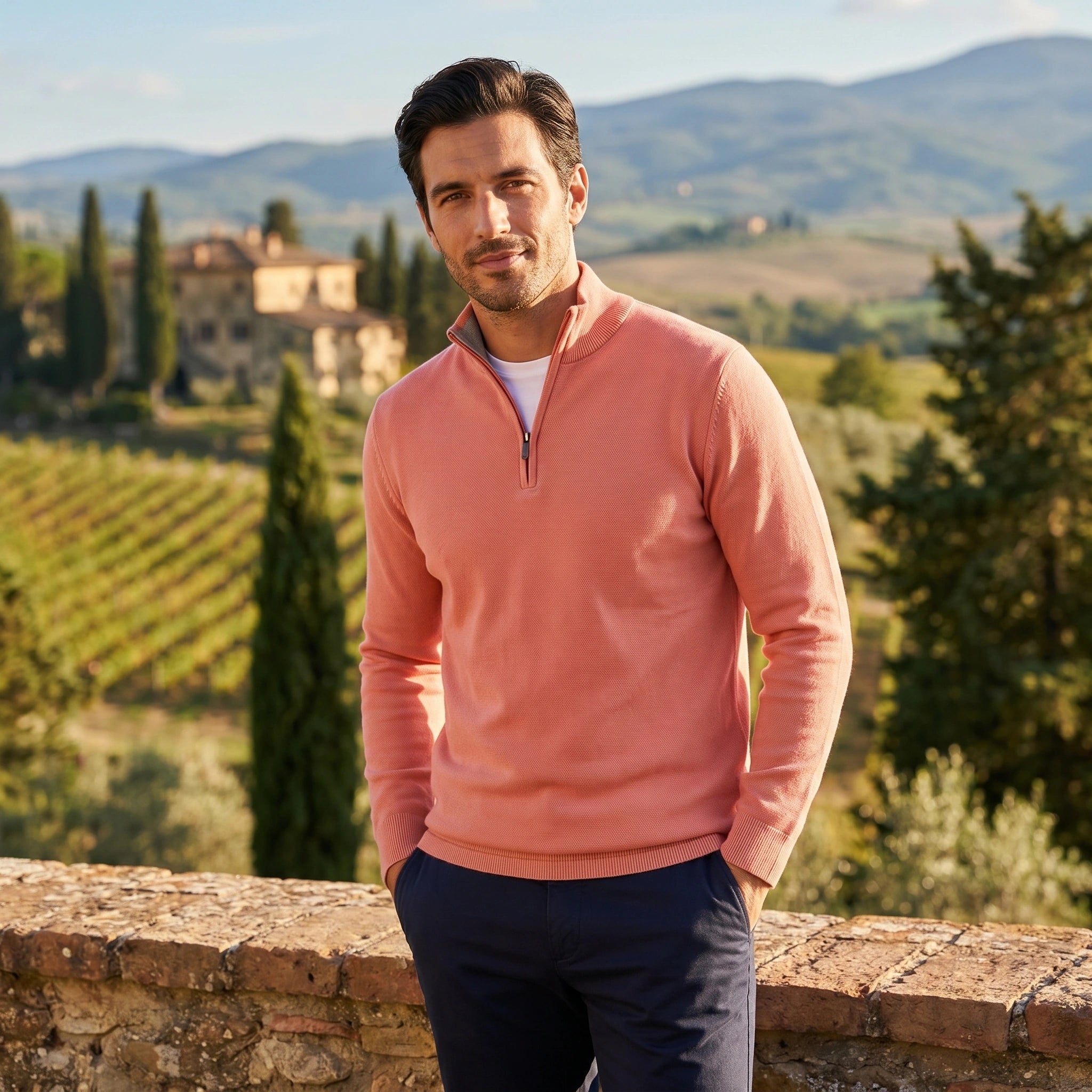 Close up view of the men's fitted quarter zip sweater showing its soft fabric, precise stitching, and mock neck design in a rich navy color.