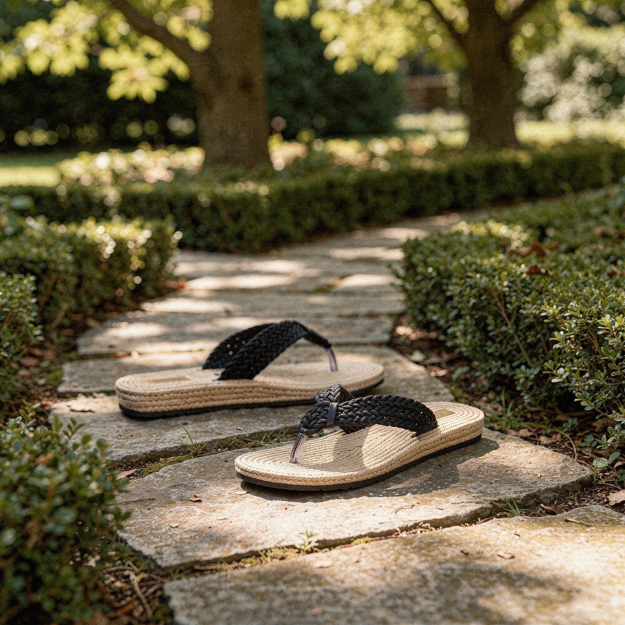 View of relaxed textured imitation hemp flip flops in natural beige, showcasing the soft material and comfortable design