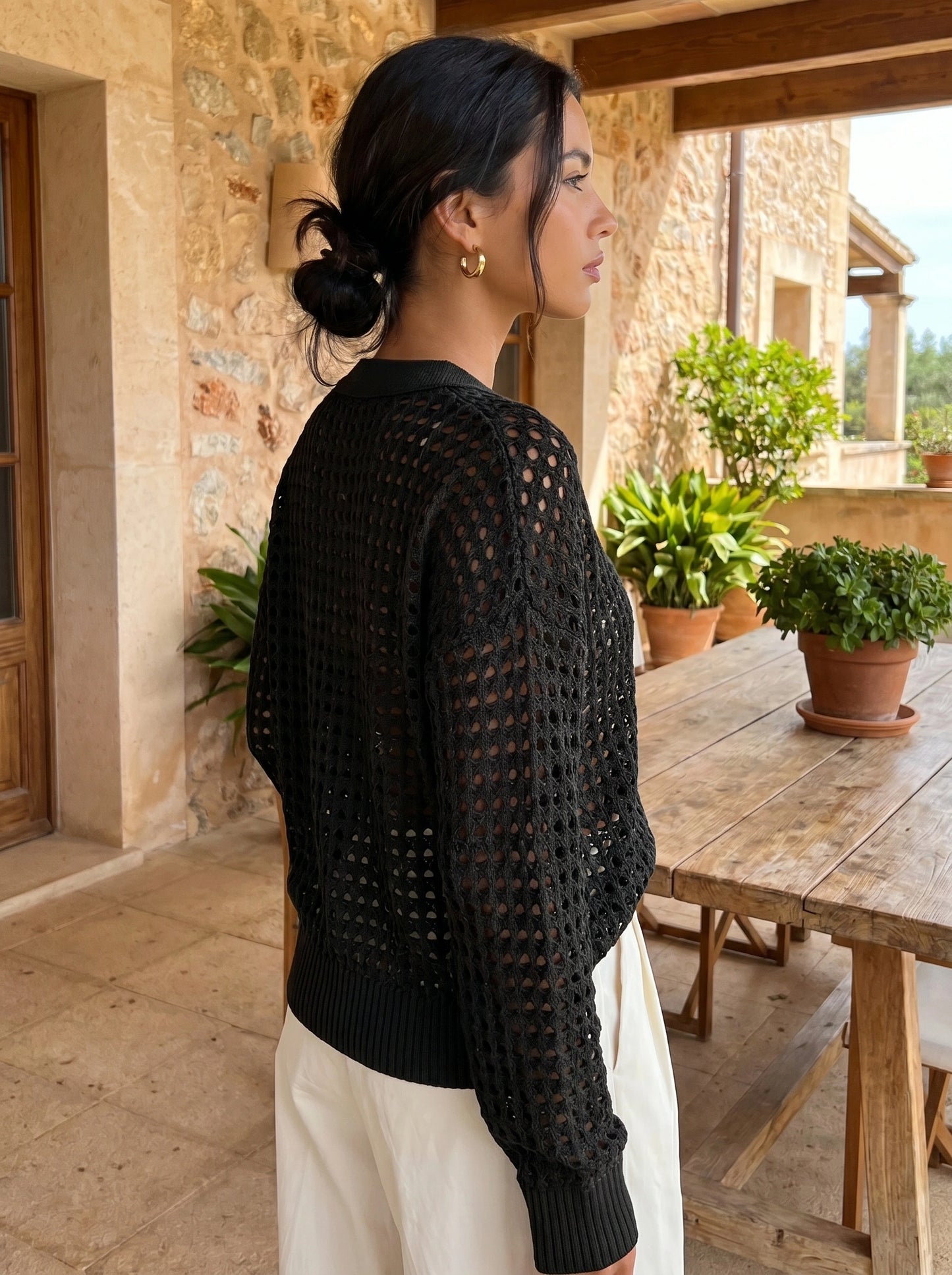 Close up view of the Womens Hollow Knit Autumn Cardigan showing intricate stitching and soft fabric texture, perfect for layering in fall fashion.
