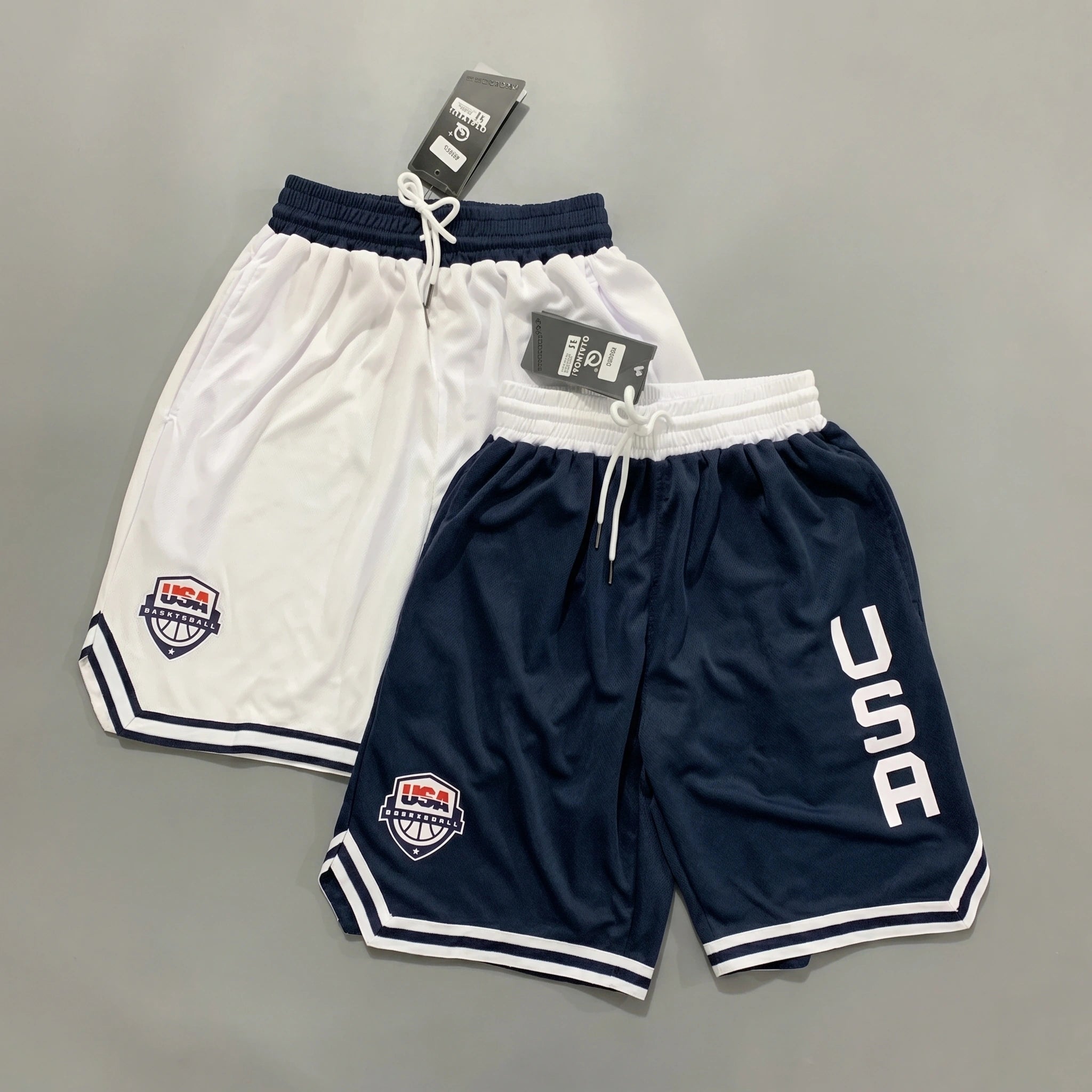 Close up view of the breathable fabric and precise stitching of men's athletic lightweight summer shorts in a colorful, showing quality and attention to .