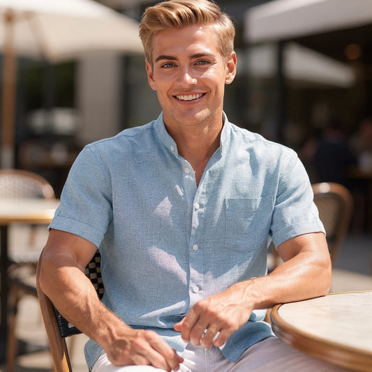 View of a relaxed fit henley shirt in light gray cotton, featuring a three button placket and a casual style