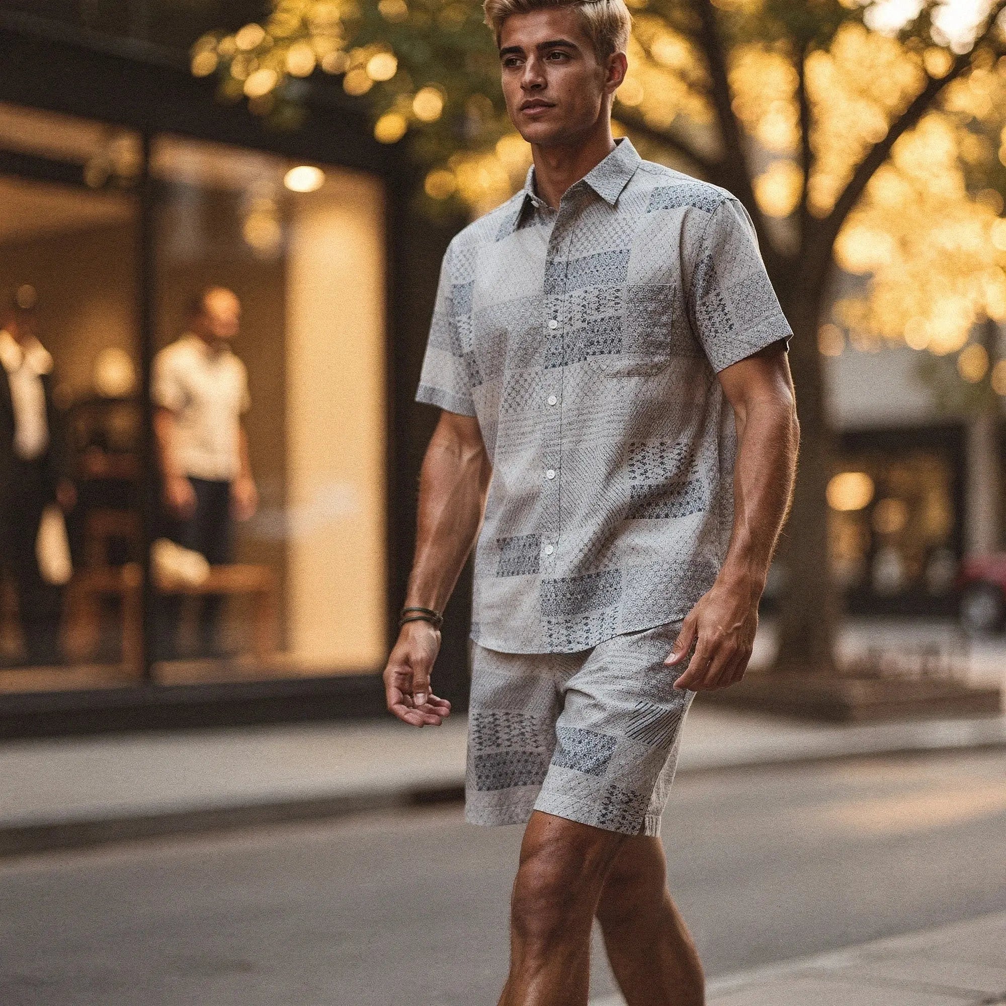Light blue short sleeve button up resort shirt made of soft fabric, featuring a relaxed fit and subtle pattern, view