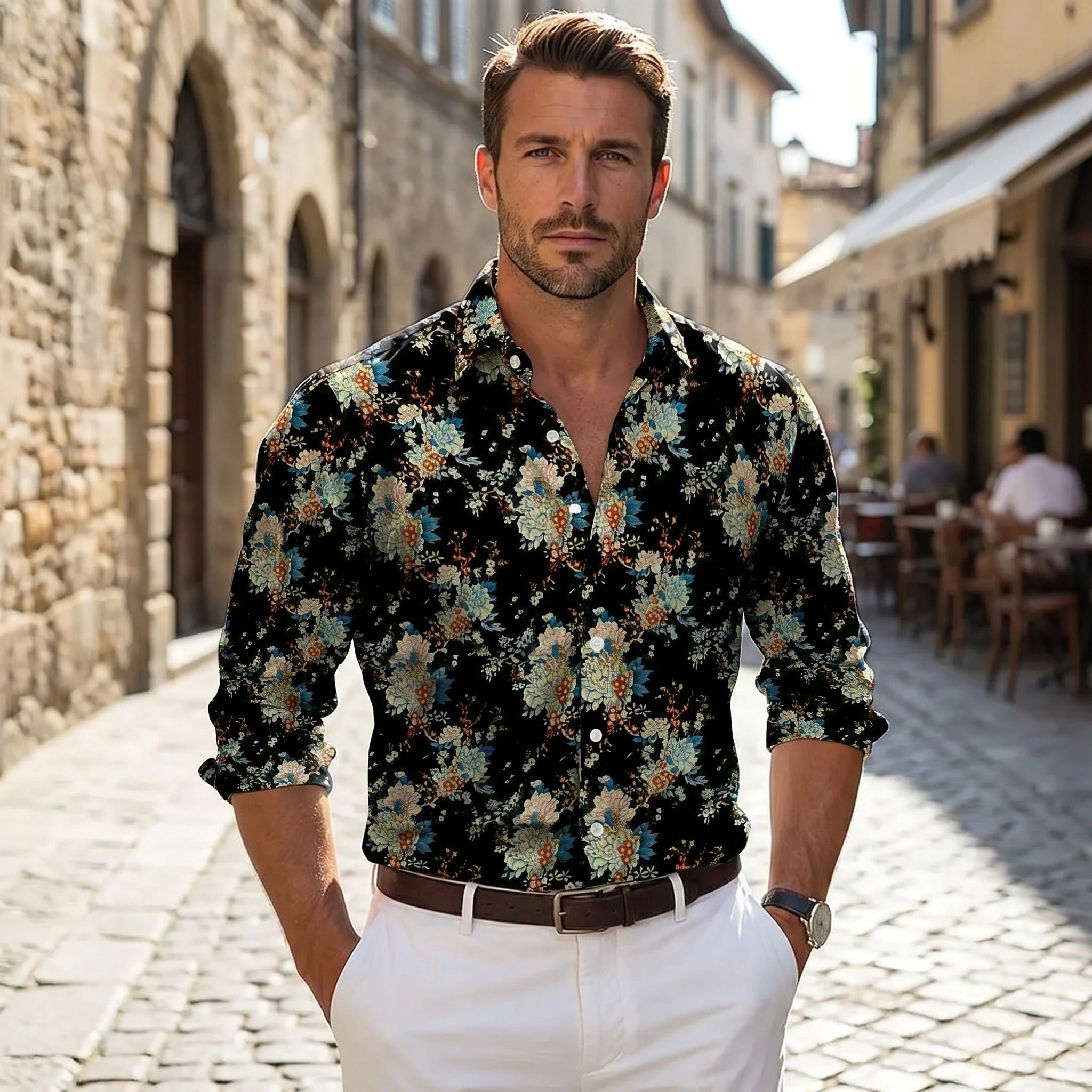 Close up view of the Men's Relaxed Floral Autumn Shirt showing intricate stitching and vibrant floral patterns on a soft fabric background.