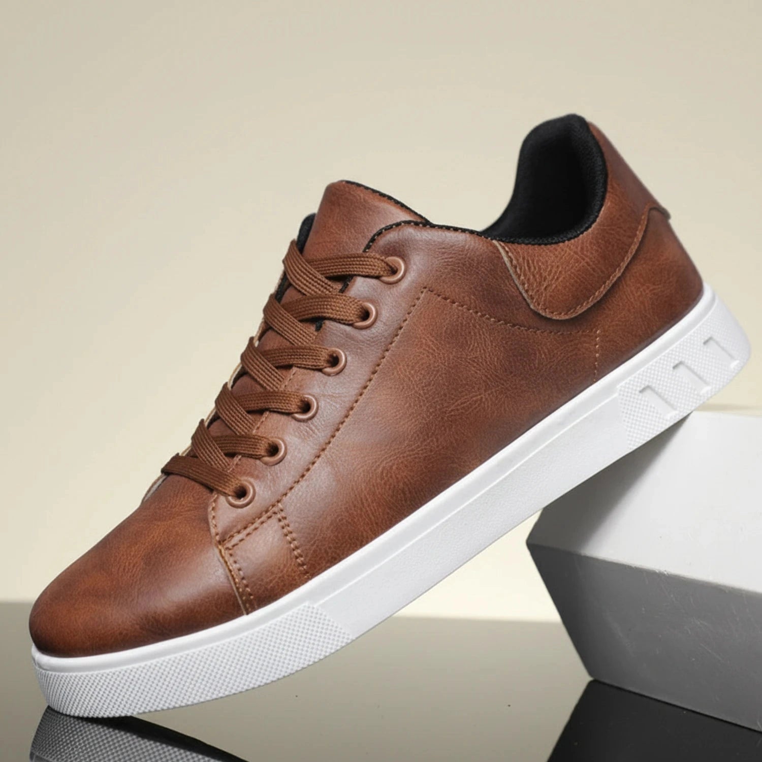 View of stylish men's casual shoes in dark brown leather with lace up design and cushioned sole
