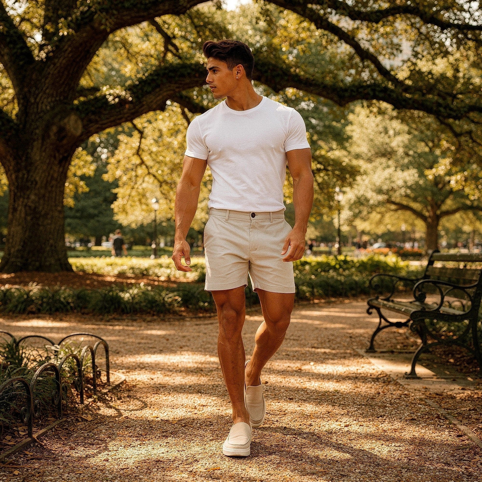 View of men's athletic fit stretch chino shorts in light beige, featuring pockets and a smooth fabric texture
