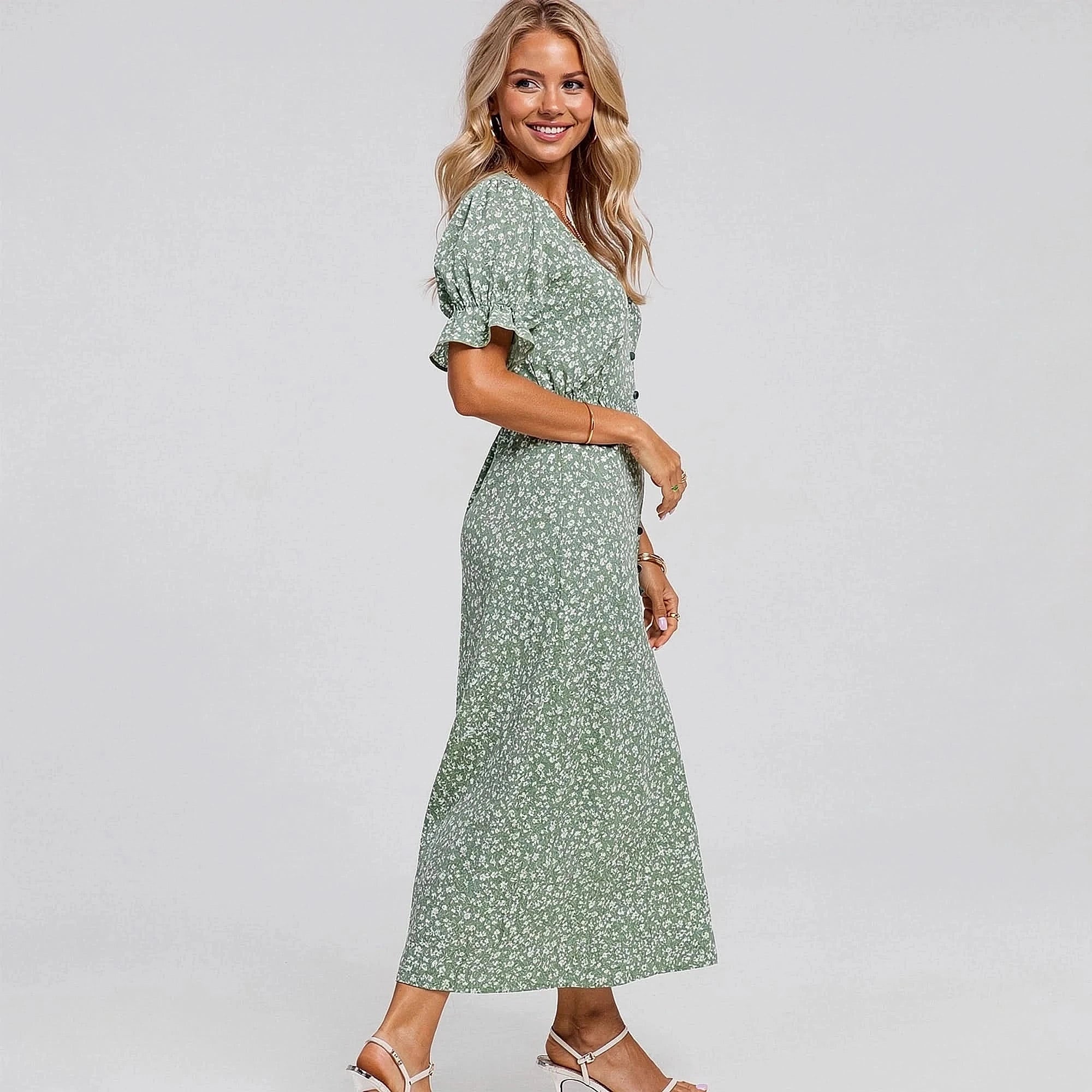 Elegant floral midi dress featuring puff sleeves, a soft fabric, and a detailed floral pattern in pastel colors, view