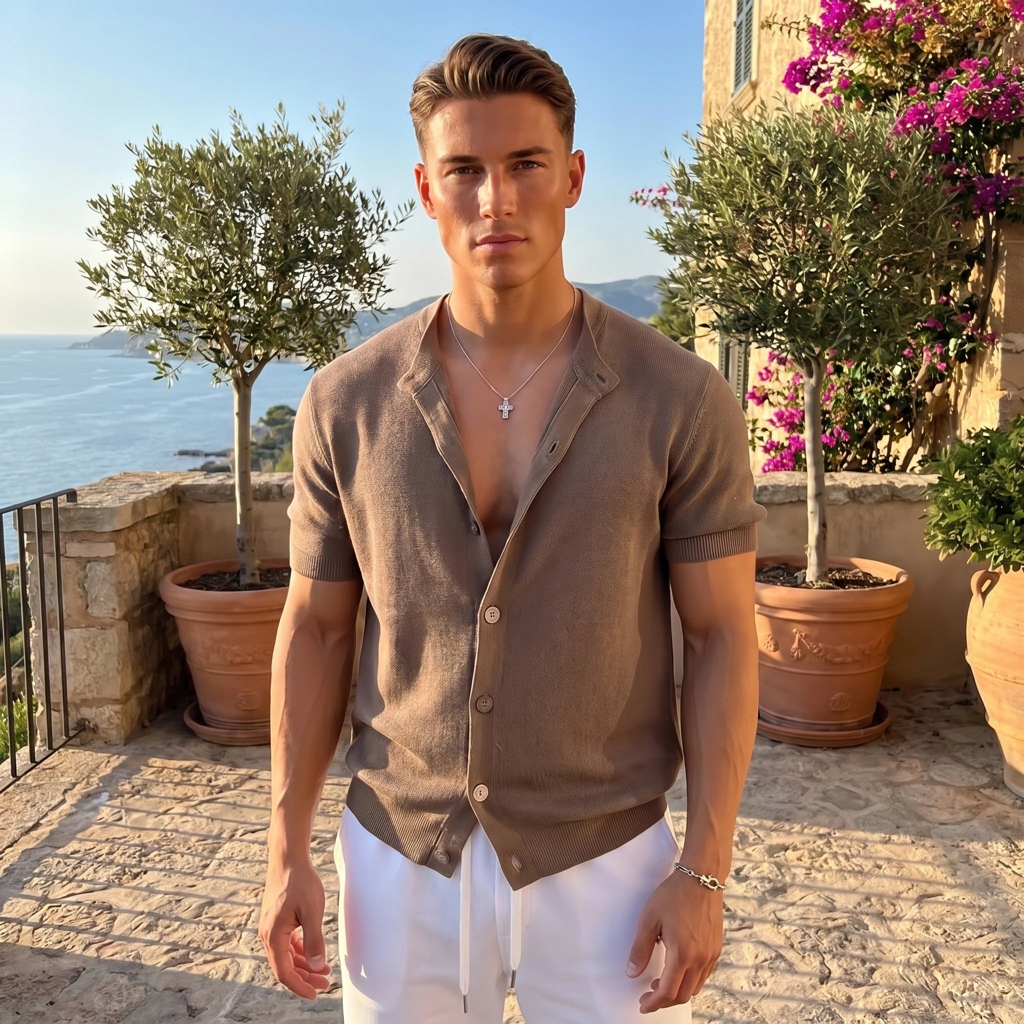 Close up view of the lightweight breathable fabric and fine stitching details of the men's summer cardigan in a soft neutral color, showing its quality and craftsmanship.