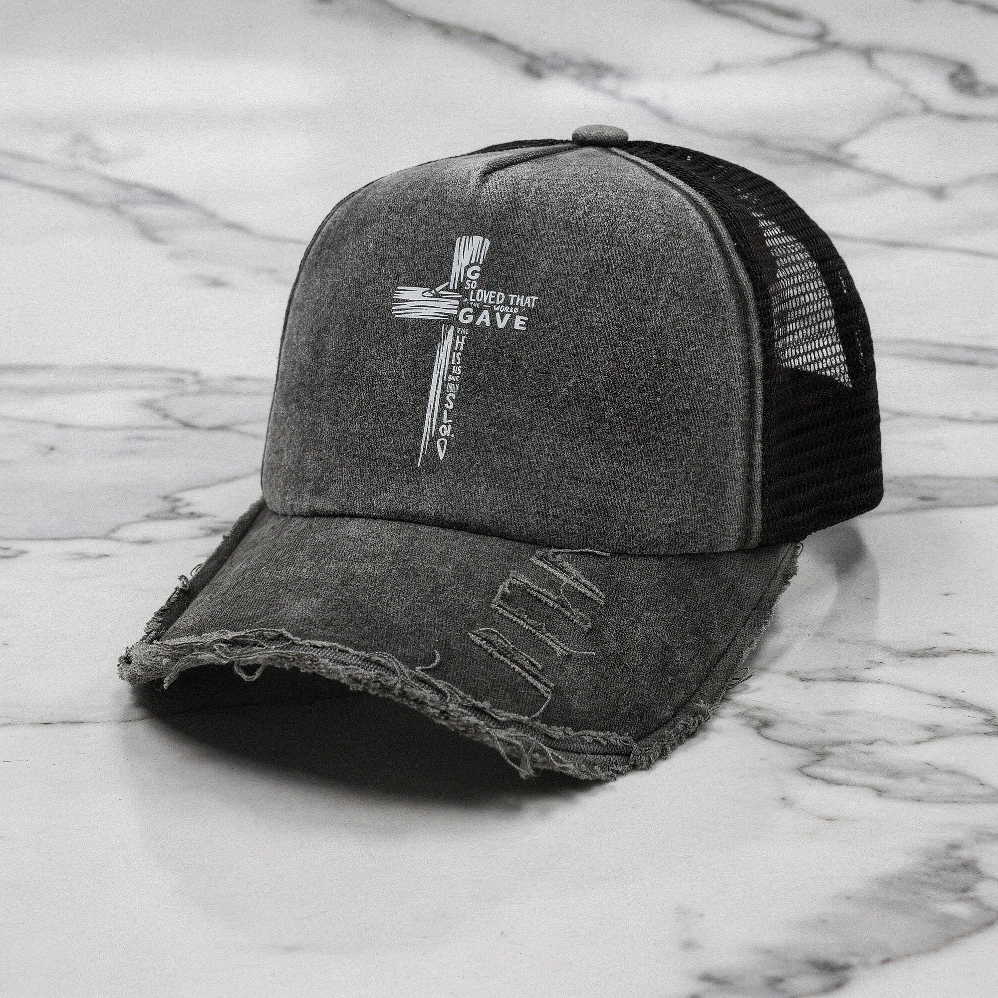 Light pink summer baseball cap made of breathable fabric, featuring a curved brim and adjustable strap, detailed view