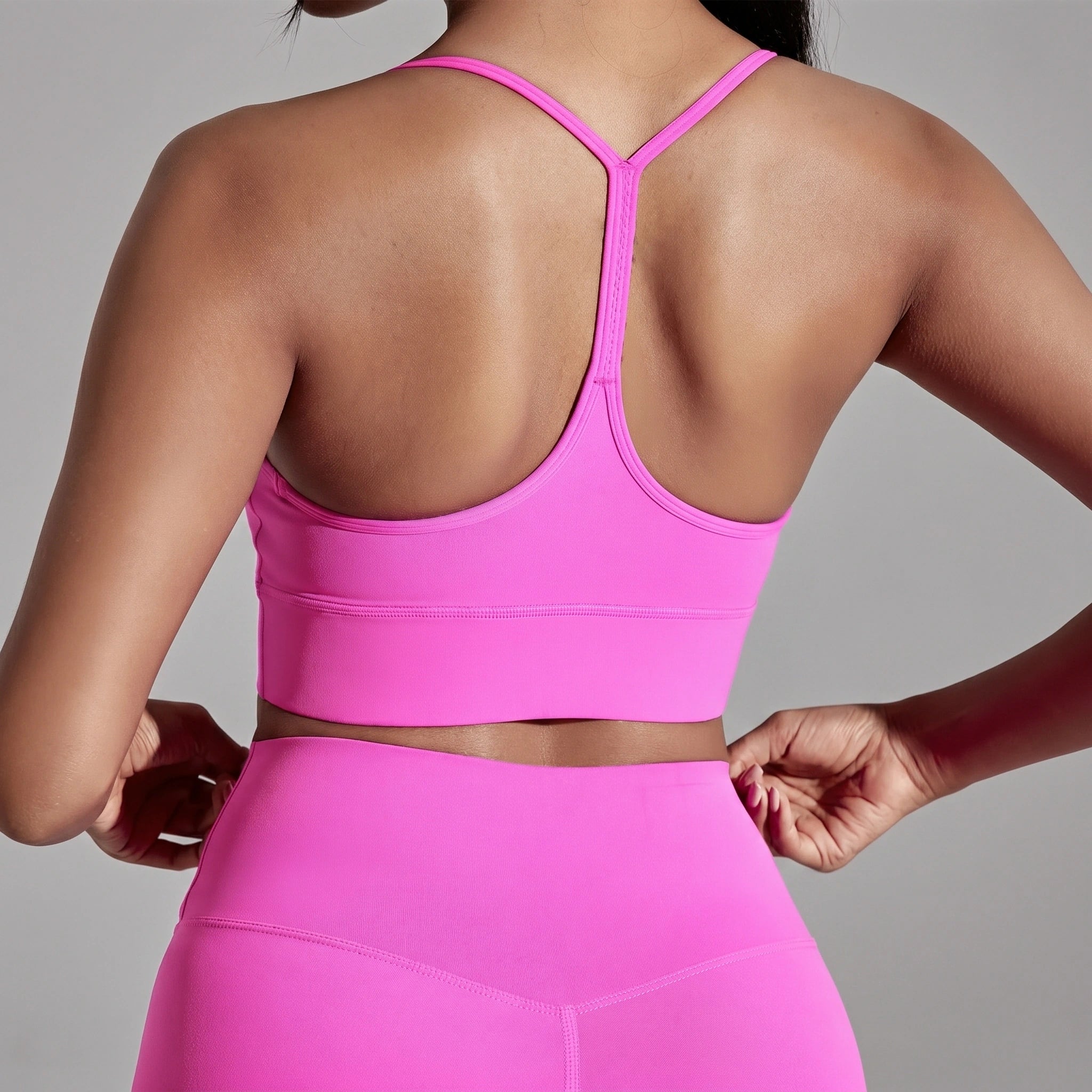 Close up view showing the soft fabric and intricate stitching of the Womens Soft Supportive Athletic Bra in a colorful, ideal for gym and yoga sessions.