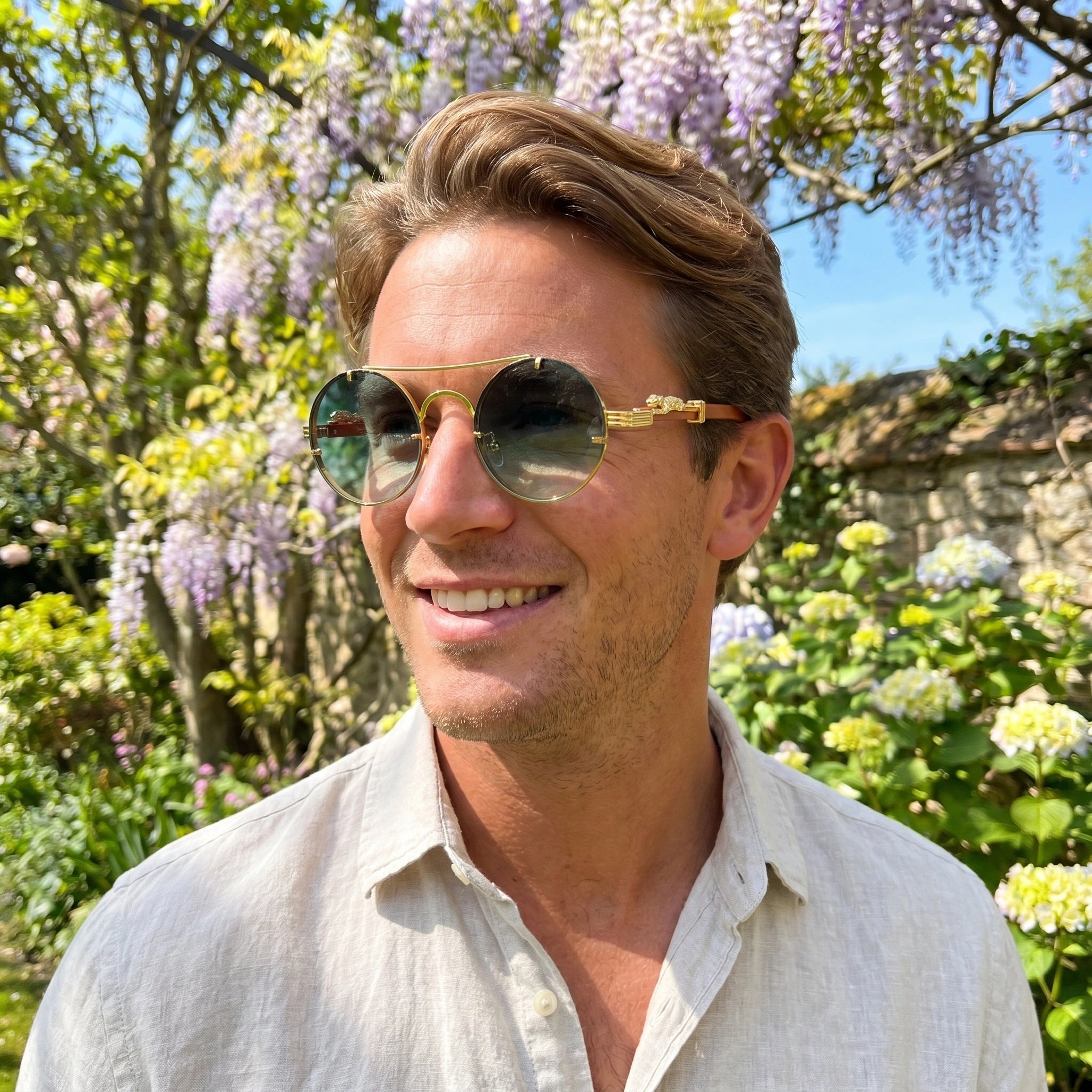 Back view of a model showing the Mens Luxe Retro Cheetah Eyewear, showing its construction details against a neutral background.