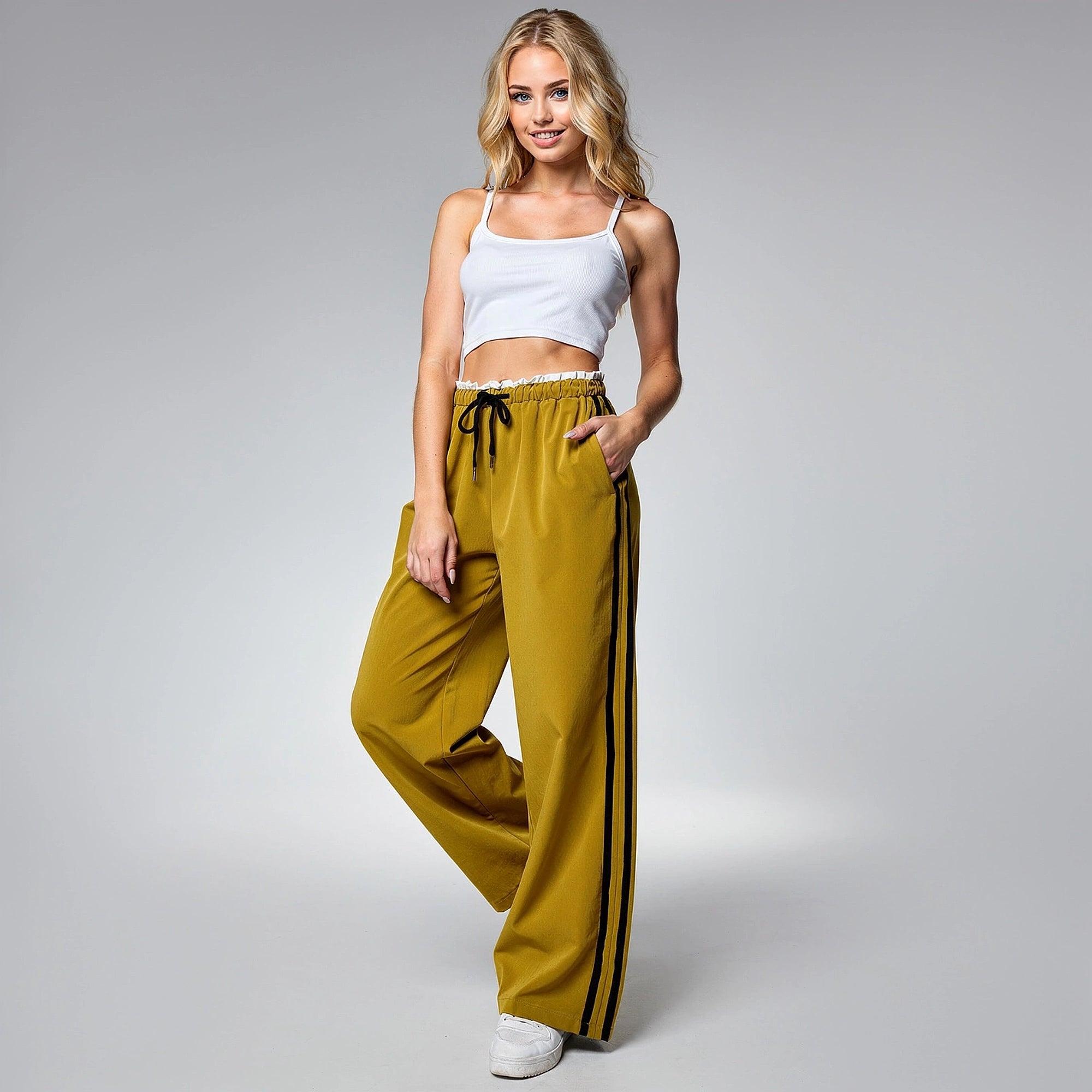 Light gray relaxed wide leg pants made from soft fabric, featuring a comfortable waistband and pockets, view