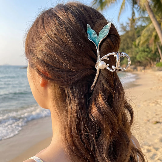Close up of the Womens Playful Unique Hair Clip showing intricate stitching and vibrant fabric, showing its whimsical design perfect for any occasion.