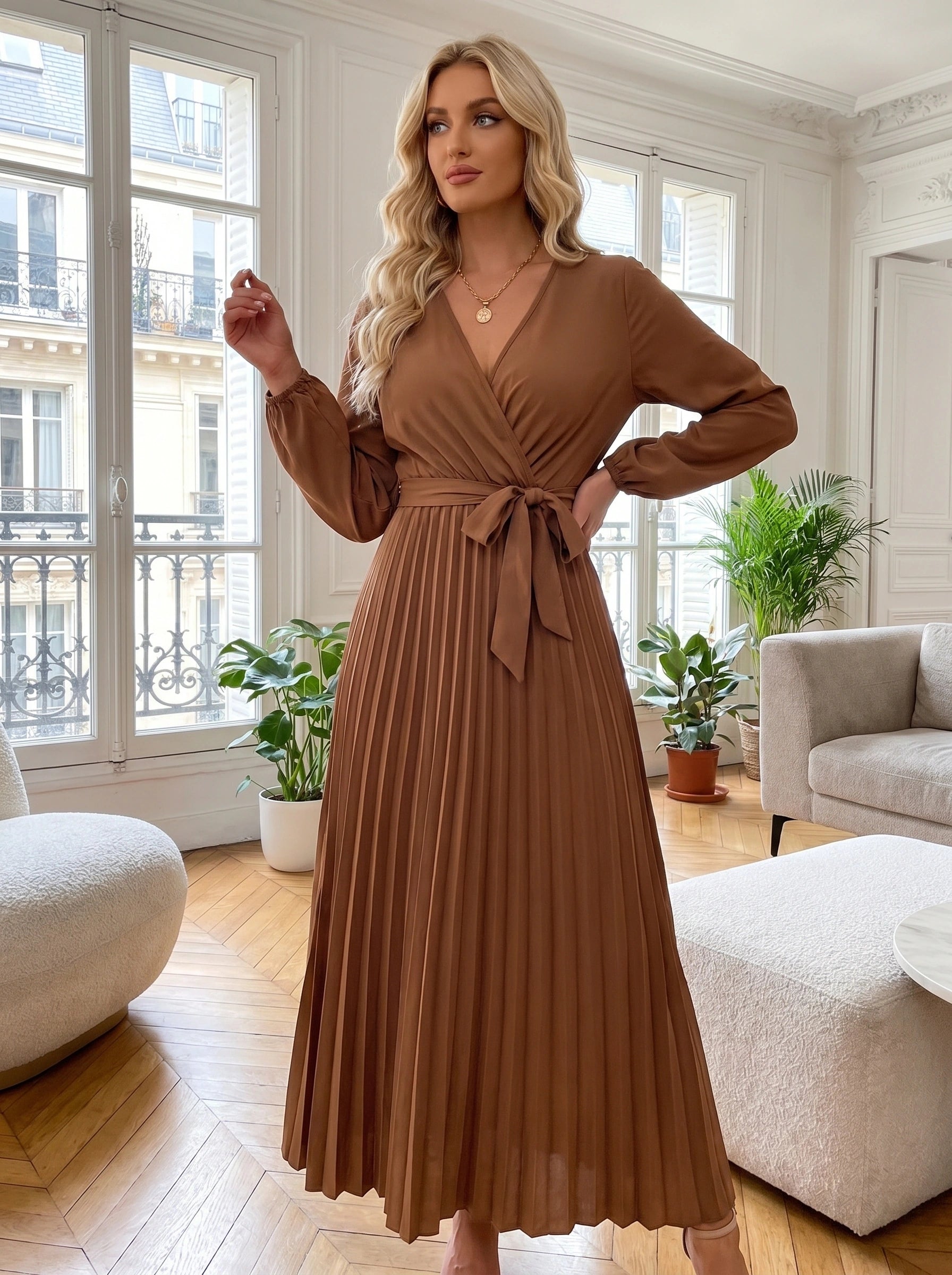 Close up of the Womens Pleated Maxi Dress showing the luxurious fabric texture and intricate stitching in a rich navy color against a soft neutral background.