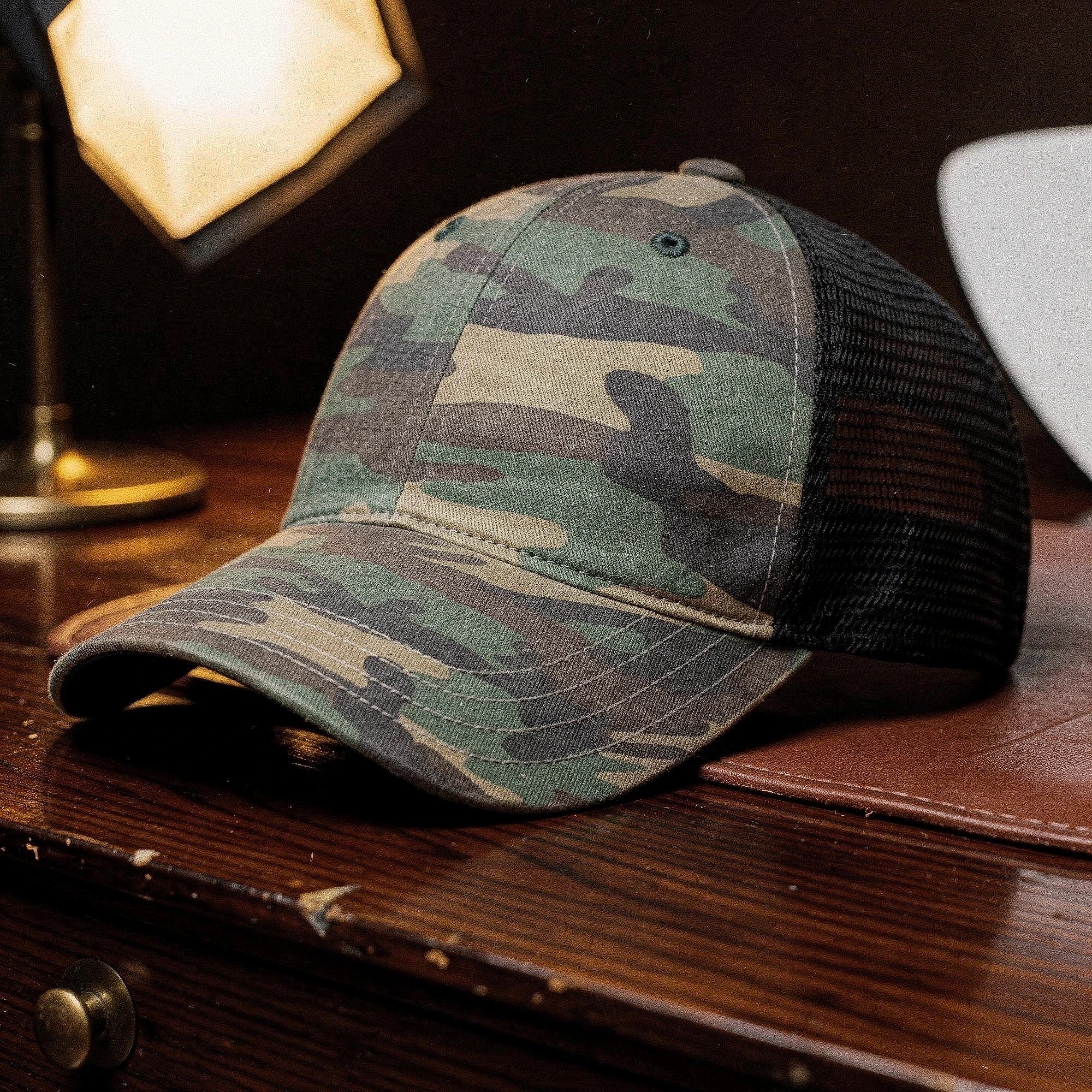 View of a relaxed vintage snapback cap in dark green, featuring a curved brim and adjustable strap