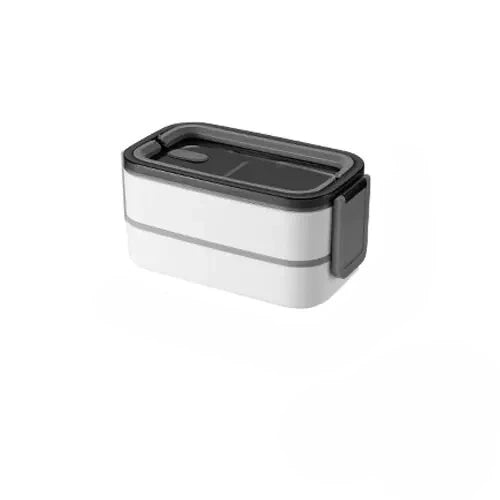 View of a sleek stainless steel double layer lunch box with a smooth silver finish, showcasing the two compartments and secure lid