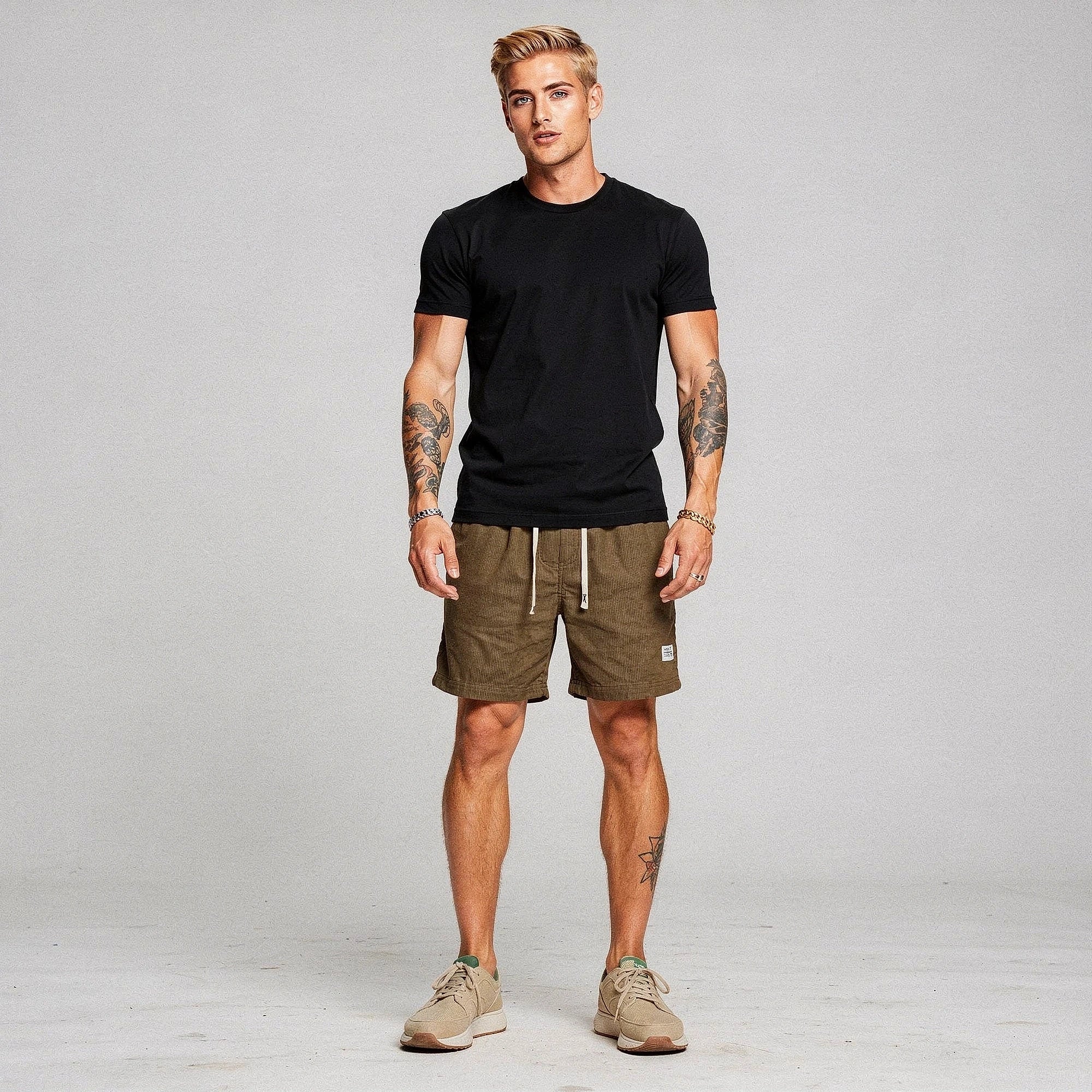 Light gray men's relaxed shorts made from stretchy fabric, featuring pockets and a comfortable waistband, view