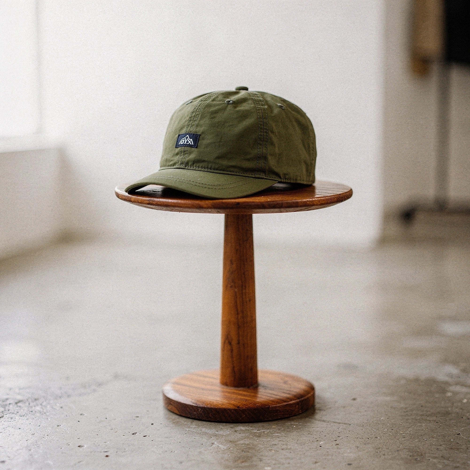 View of a stylish men's baseball cap in dark gray, featuring breathable fabric and a curved brim