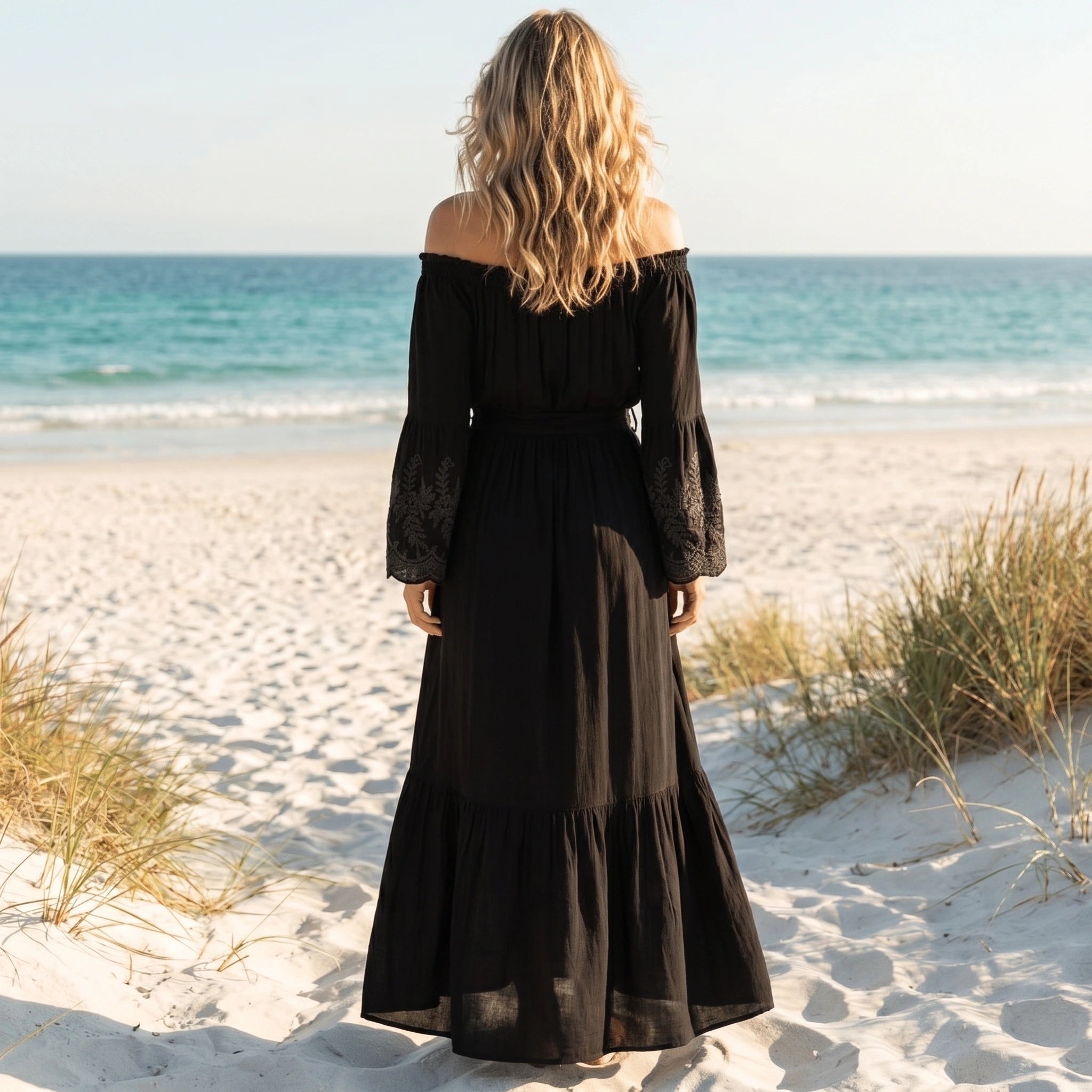 Close up view of the Womens Boho Effortless Summer Maxi Dress showing its lightweight fabric, intricate stitching, and flowing silhouette, perfect for beachside elegance.