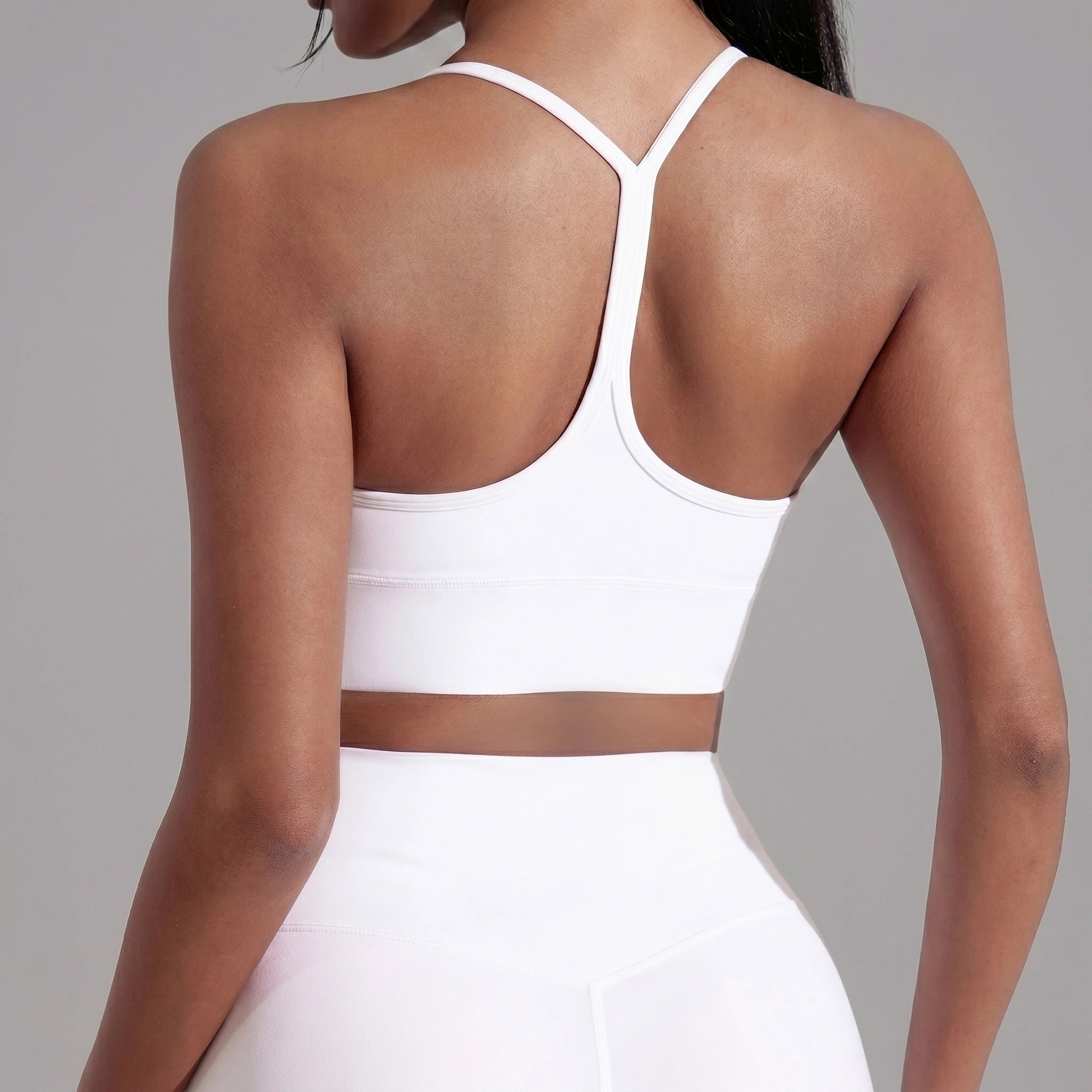 Close up showing the soft fabric and intricate stitching of the Womens Soft Supportive Athletic Bra in a , versatile color, perfect for gym and yoga sessions.