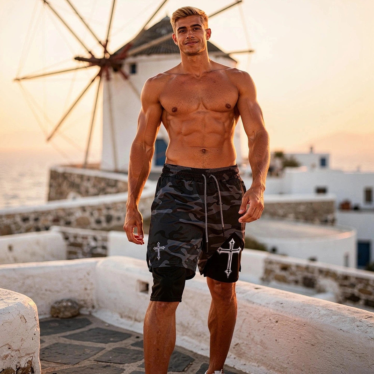View of relaxed fit activewear shorts in dark gray, featuring an elastic waistband and built in inner liner