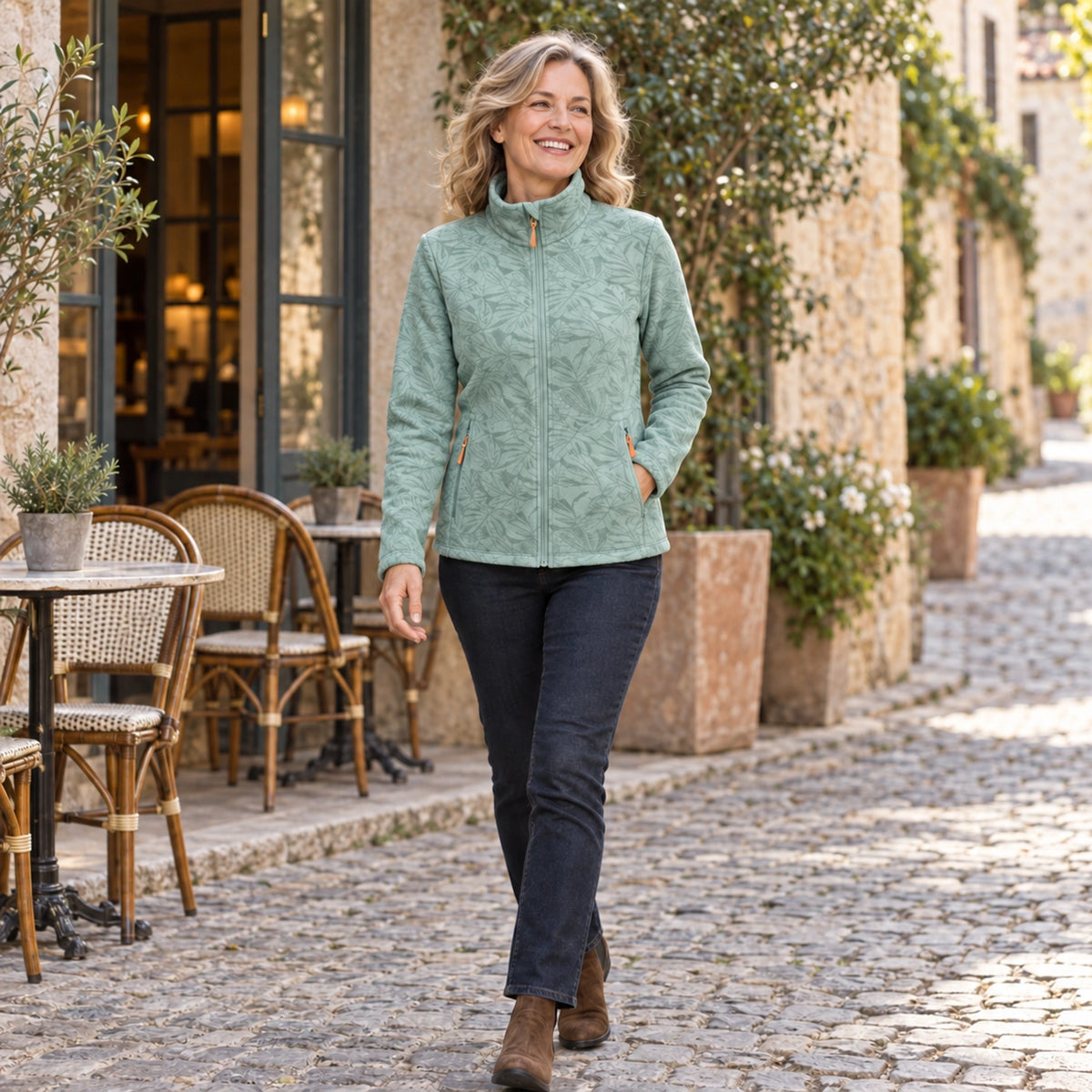 fleece jacket — Violet Light Green worn by an adult model in a realistic setting, complete garment visible — view 9