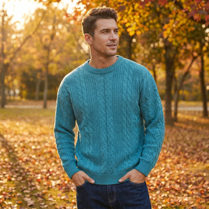 Close up view of the men's classic cable knit quarter zip sweater showing intricate stitching and textured fabric in a rich navy color.
